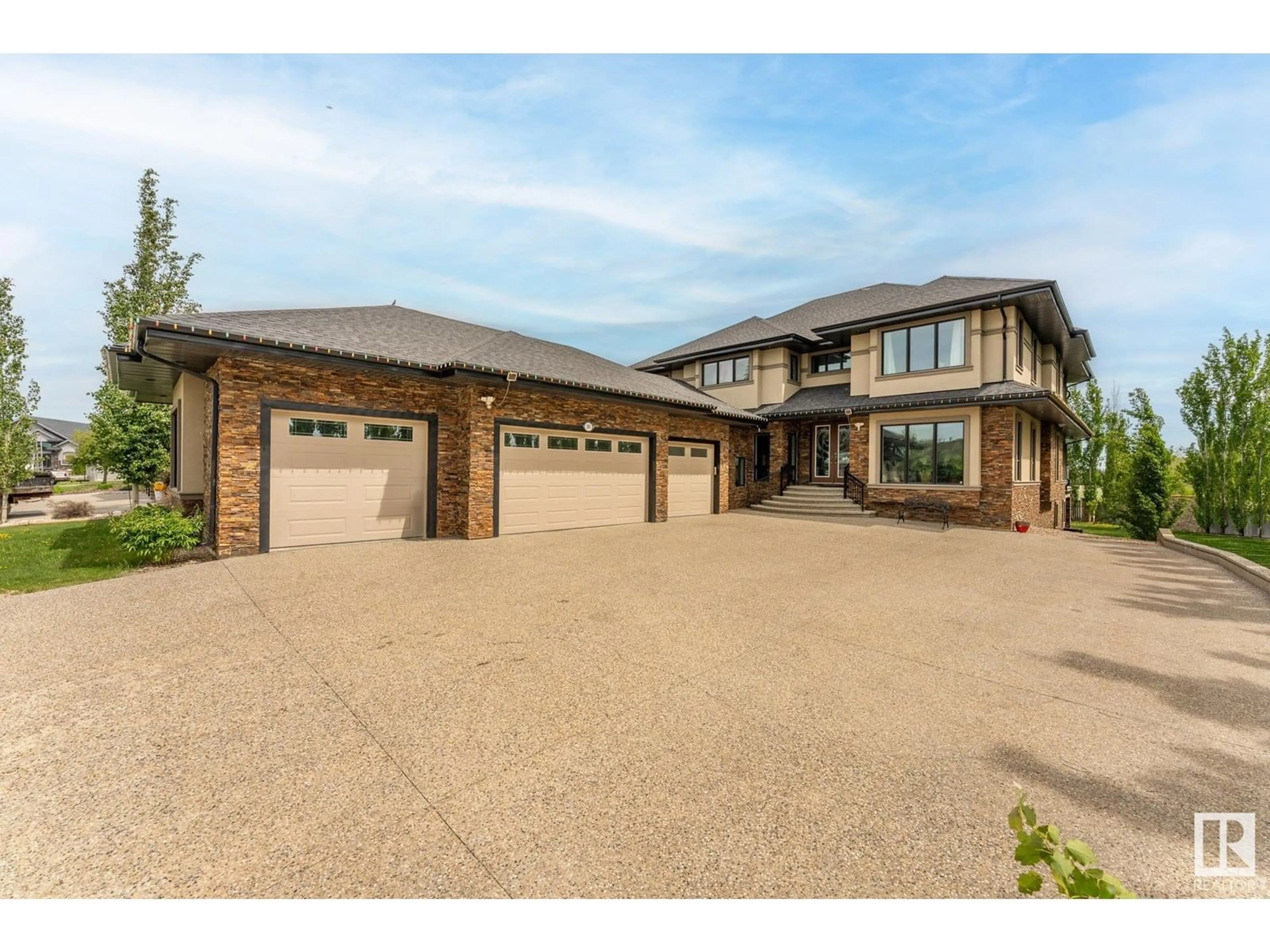 Home with brick exterior material, street for 100 54302 RGE ROAD 250, Rural Sturgeon County Alberta T8T0C9