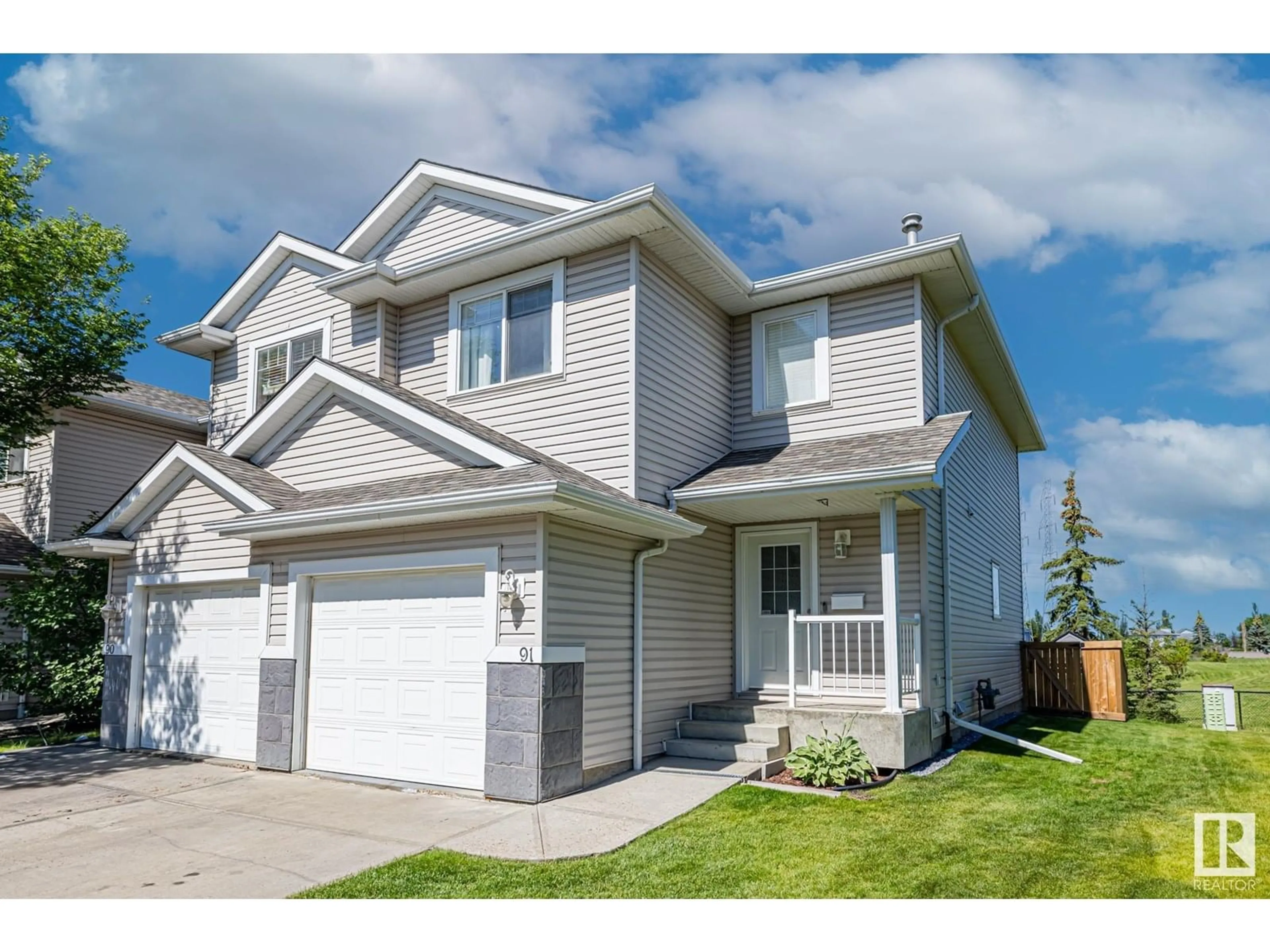 Home with vinyl exterior material, street for #91 - 4350 23 ST, Edmonton Alberta T6T1X8