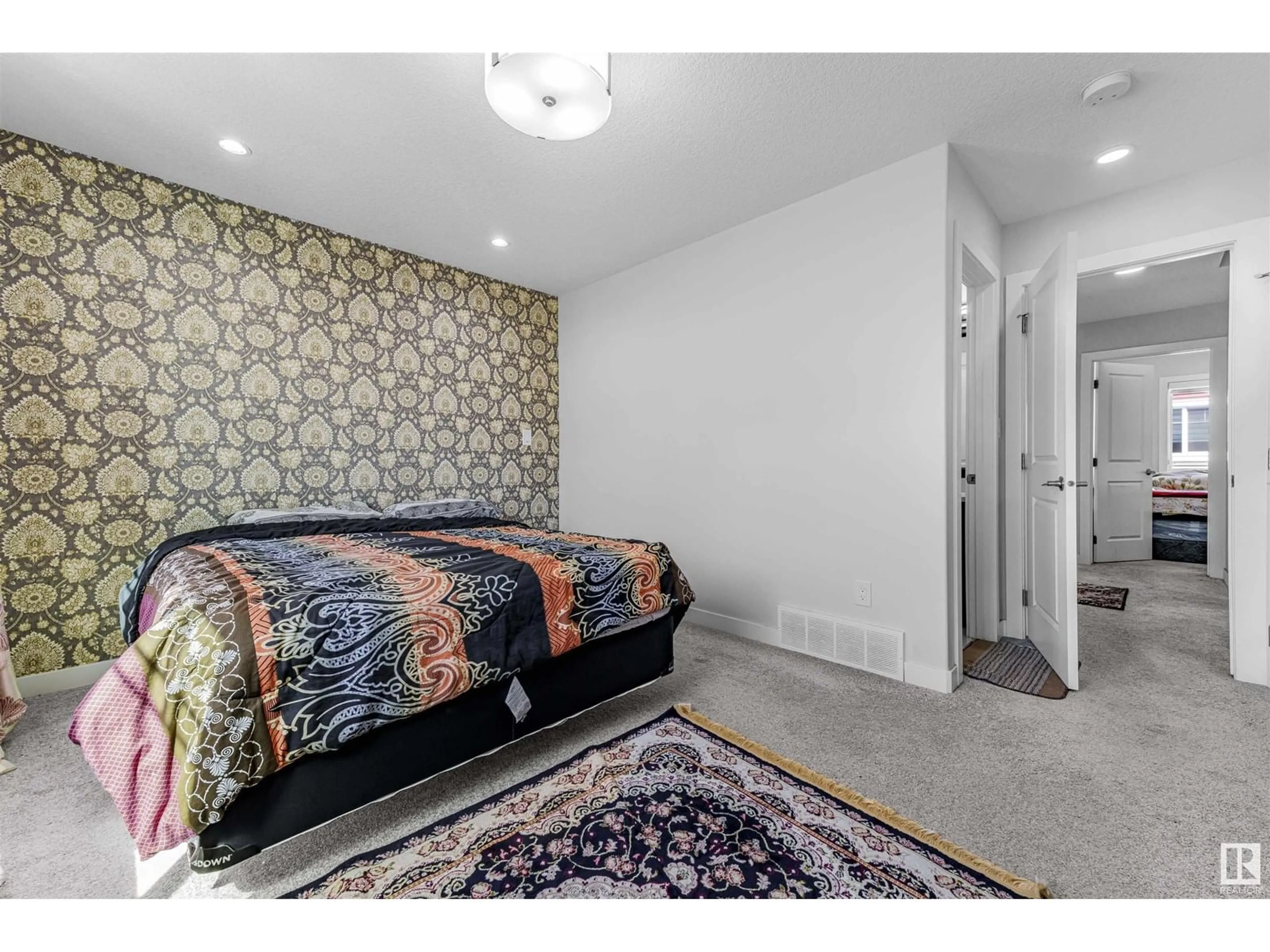 Bedroom with bed, carpet floor for 2803 - 20 14 AV, Edmonton Alberta T6T2K4