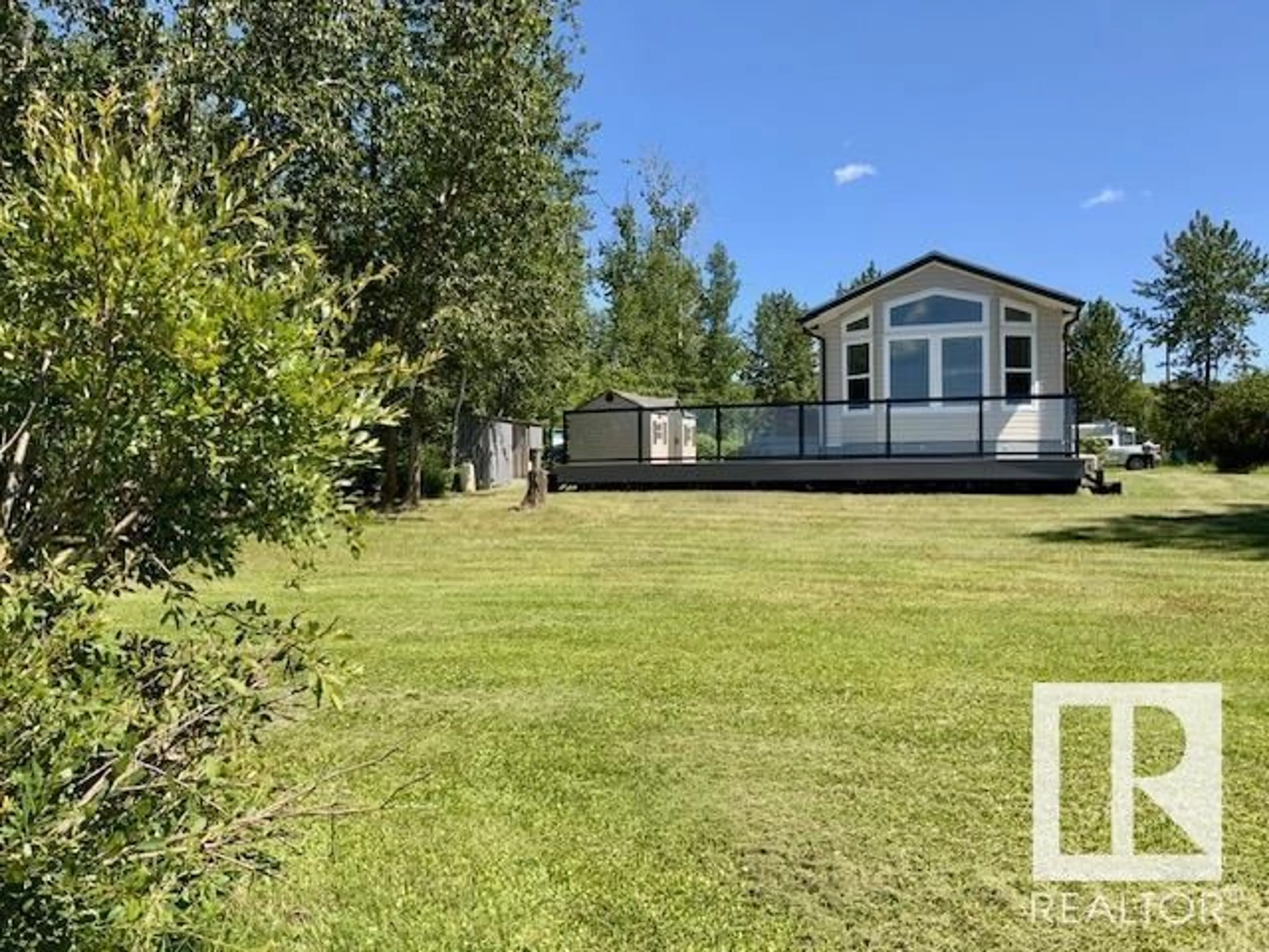 A pic from outside/outdoor area/front of a property/back of a property/a pic from drone, unknown for 324 TWP ROAD 460, Rural Wetaskiwin County Alberta T0C1H0