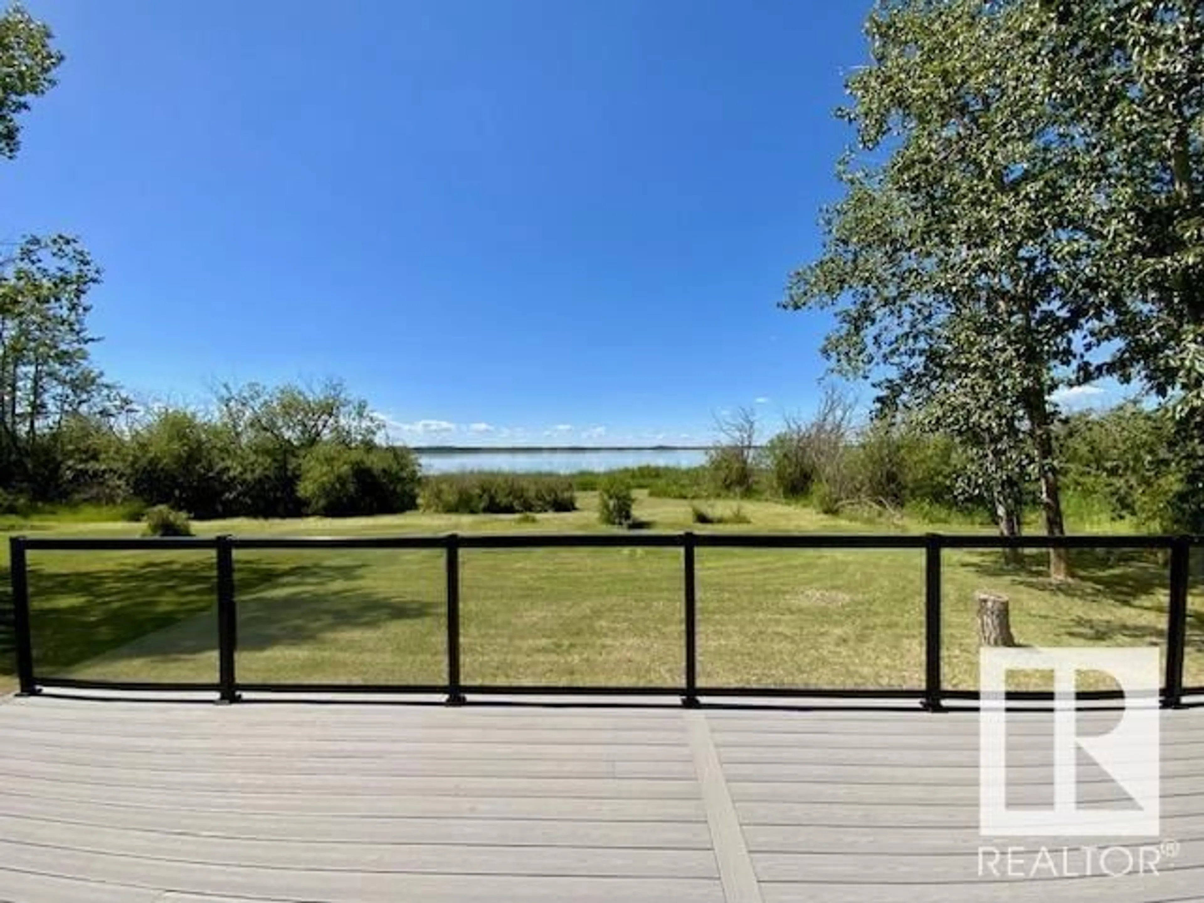 A pic from outside/outdoor area/front of a property/back of a property/a pic from drone, water/lake/river/ocean view for 324 TWP ROAD 460, Rural Wetaskiwin County Alberta T0C1H0