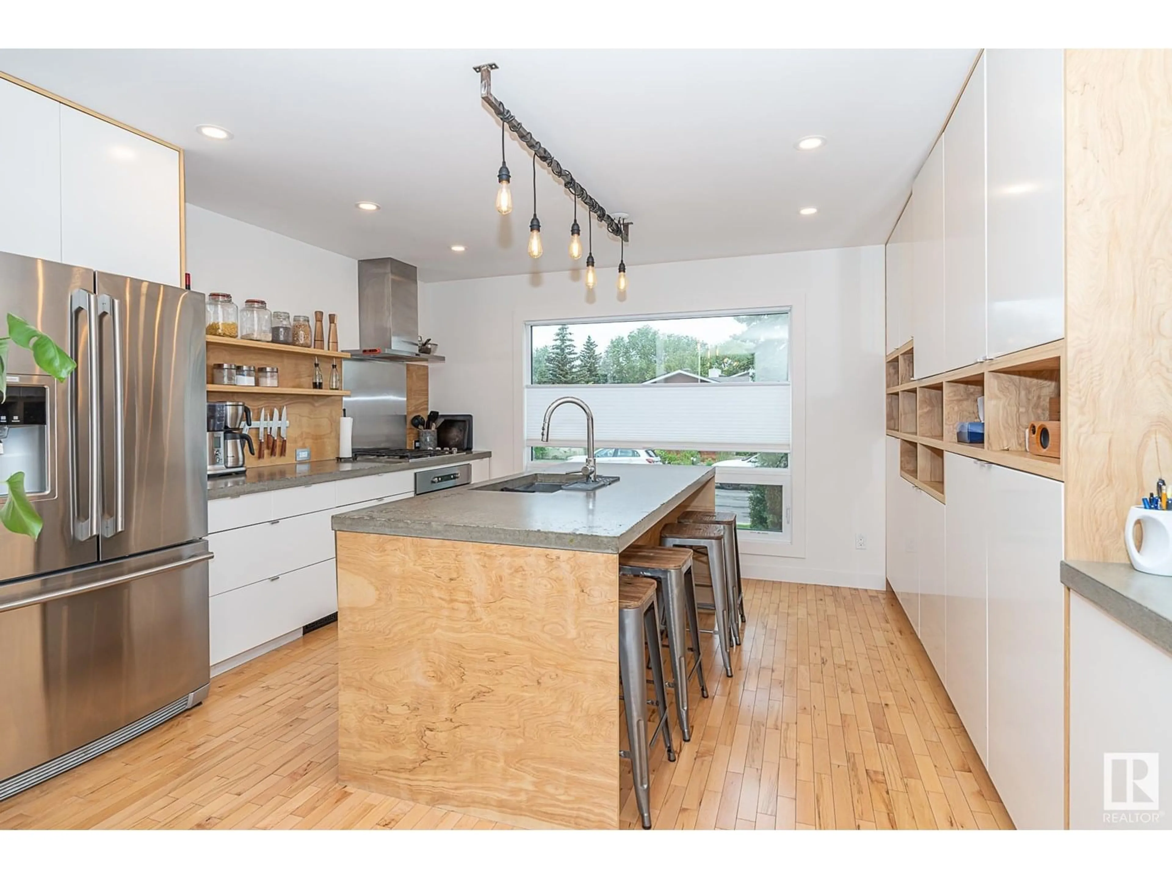 Open concept kitchen, wood/laminate floor for 12211 42A AV, Edmonton Alberta T6J0X5
