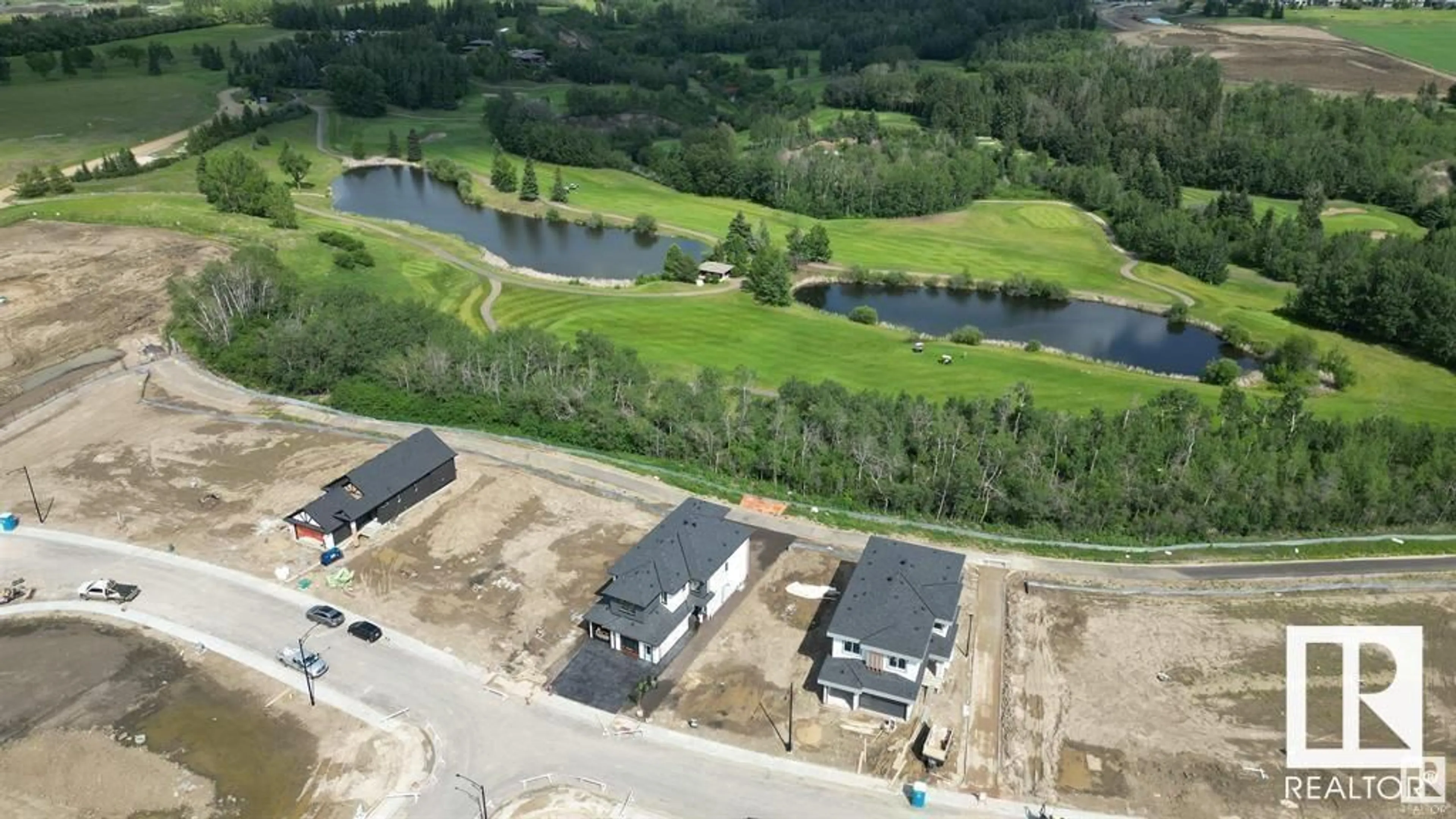A pic from outside/outdoor area/front of a property/back of a property/a pic from drone, water/lake/river/ocean view for SW - 1339 155 ST, Edmonton Alberta T6W5J5