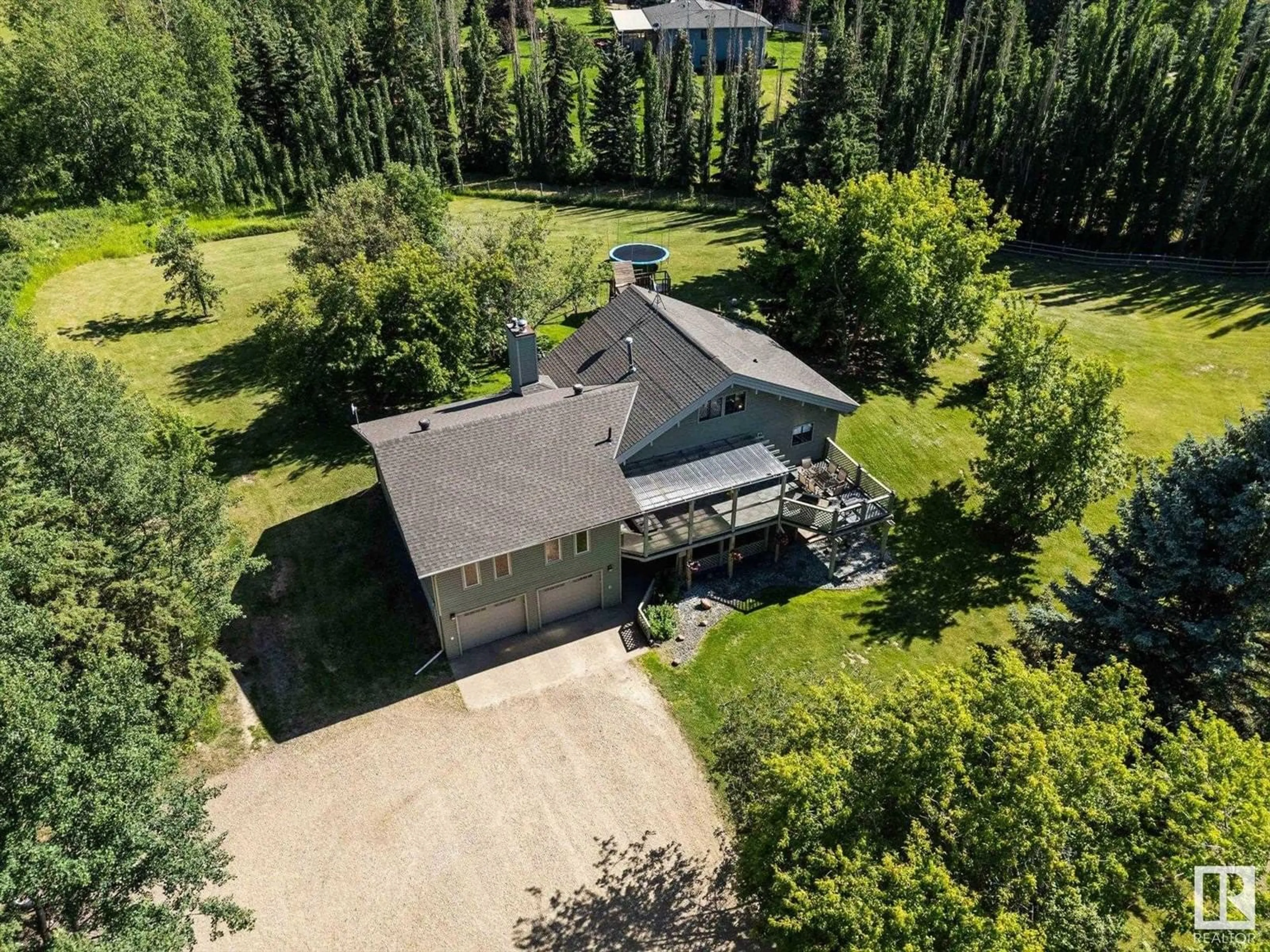 A pic from outside/outdoor area/front of a property/back of a property/a pic from drone, unknown for #4 - 1017 TWP ROAD 540, Rural Parkland County Alberta T7Y0A6