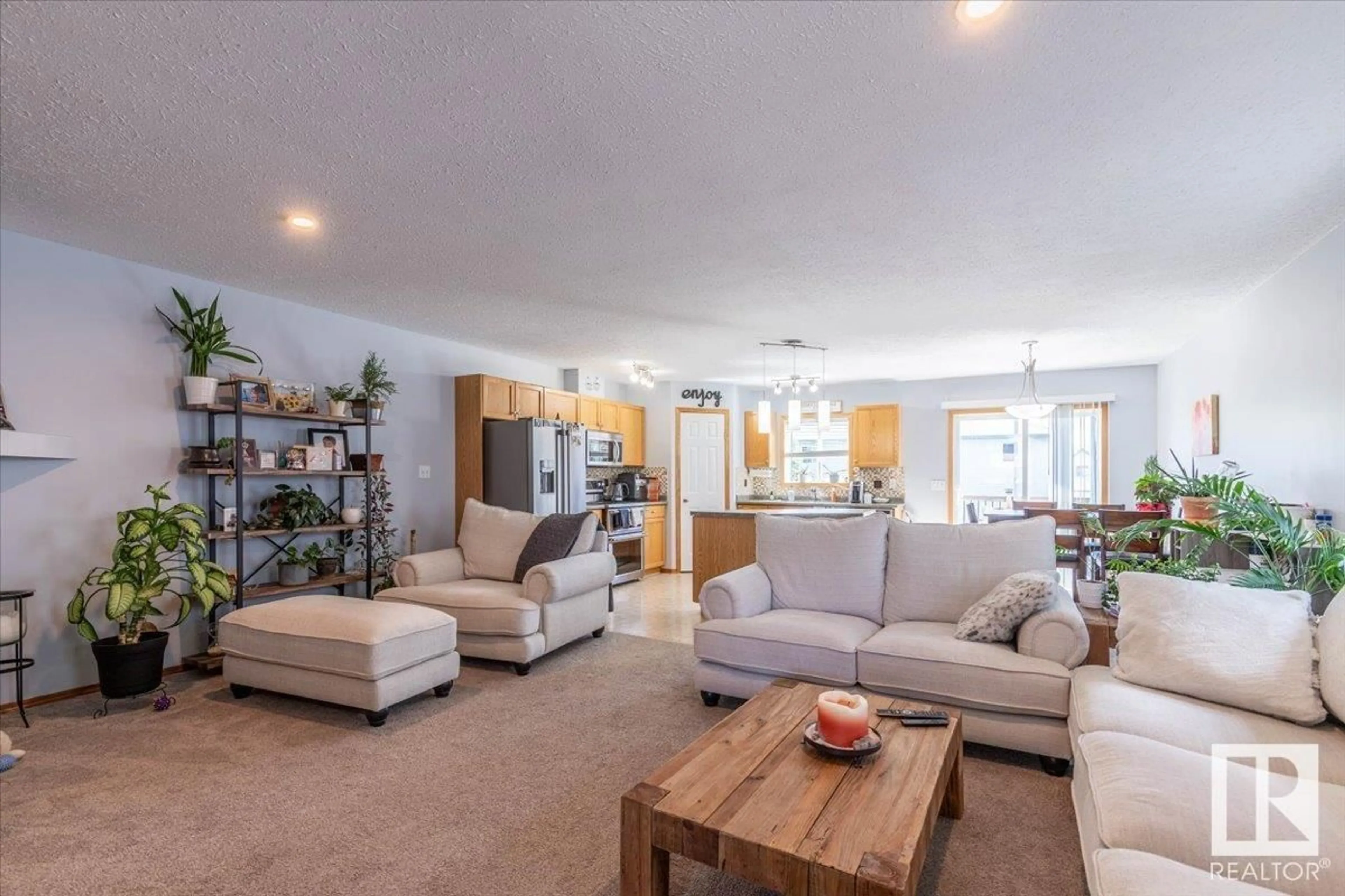 Living room with furniture, unknown for 501 KANANASKIS DR, Devon Alberta T9G2C8