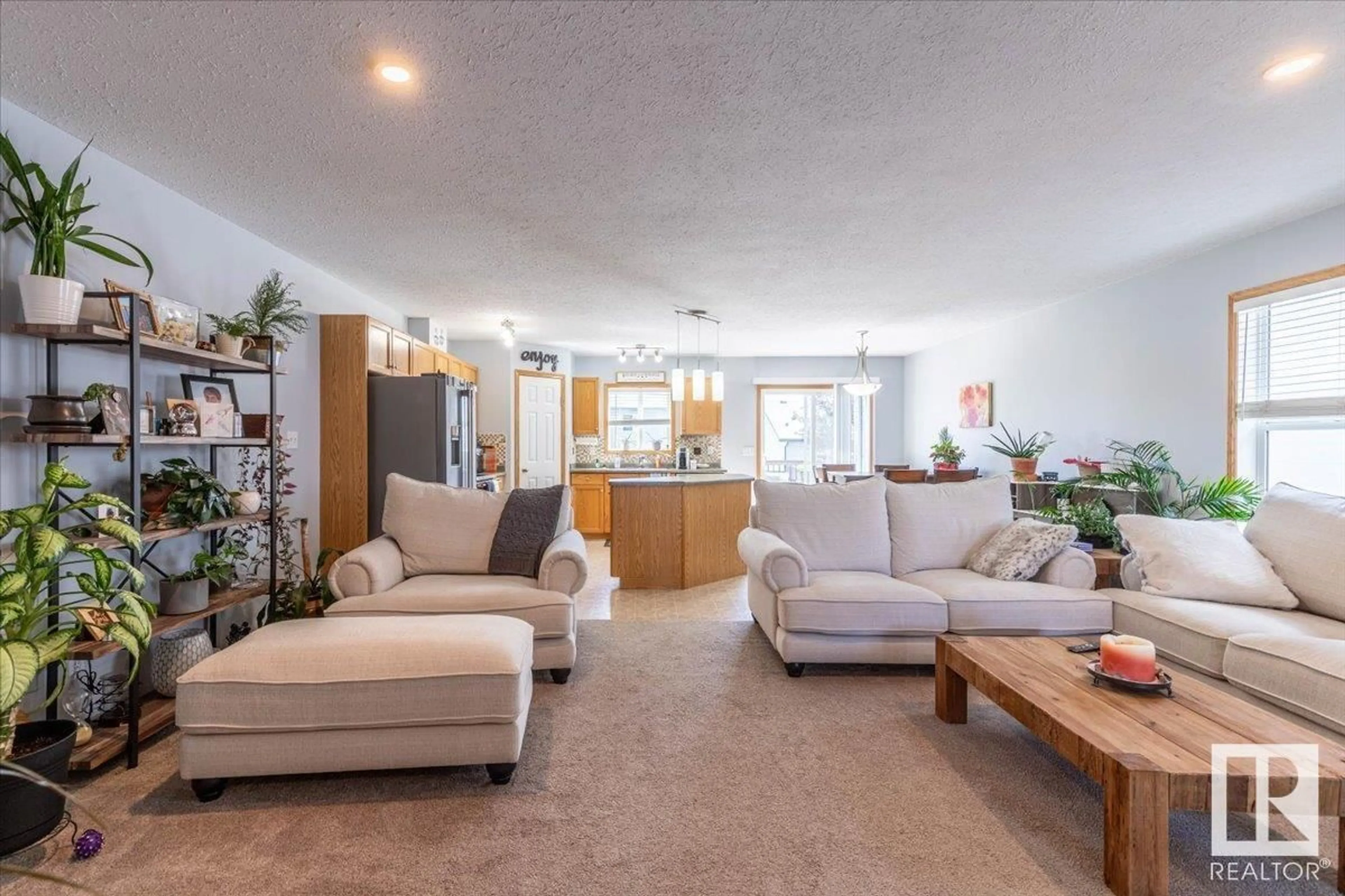 Living room with furniture, unknown for 501 KANANASKIS DR, Devon Alberta T9G2C8