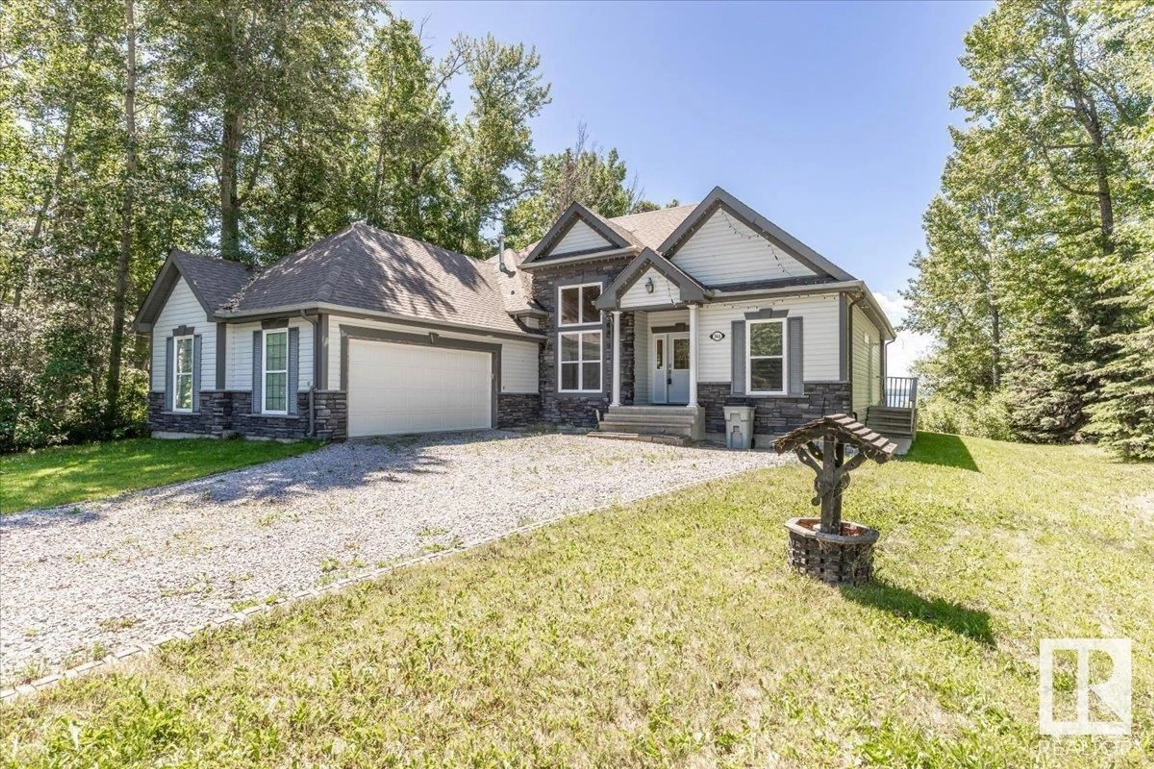 Home with vinyl exterior material, street for A54 JOHNSONIA, Rural Leduc County Alberta T0C2C0