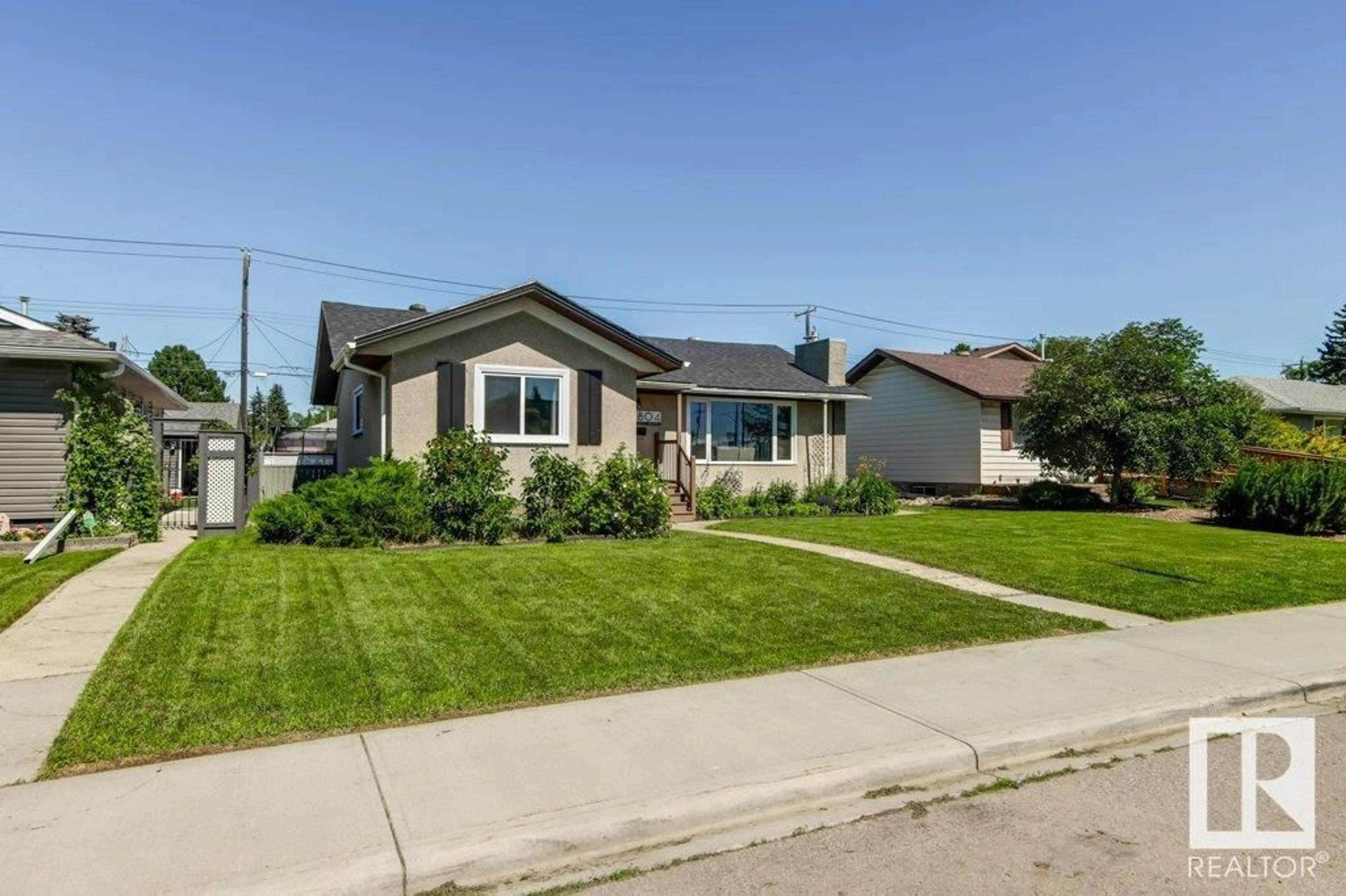 Home with vinyl exterior material, street for 7804 ARGYLL RD, Edmonton Alberta T6C4A8