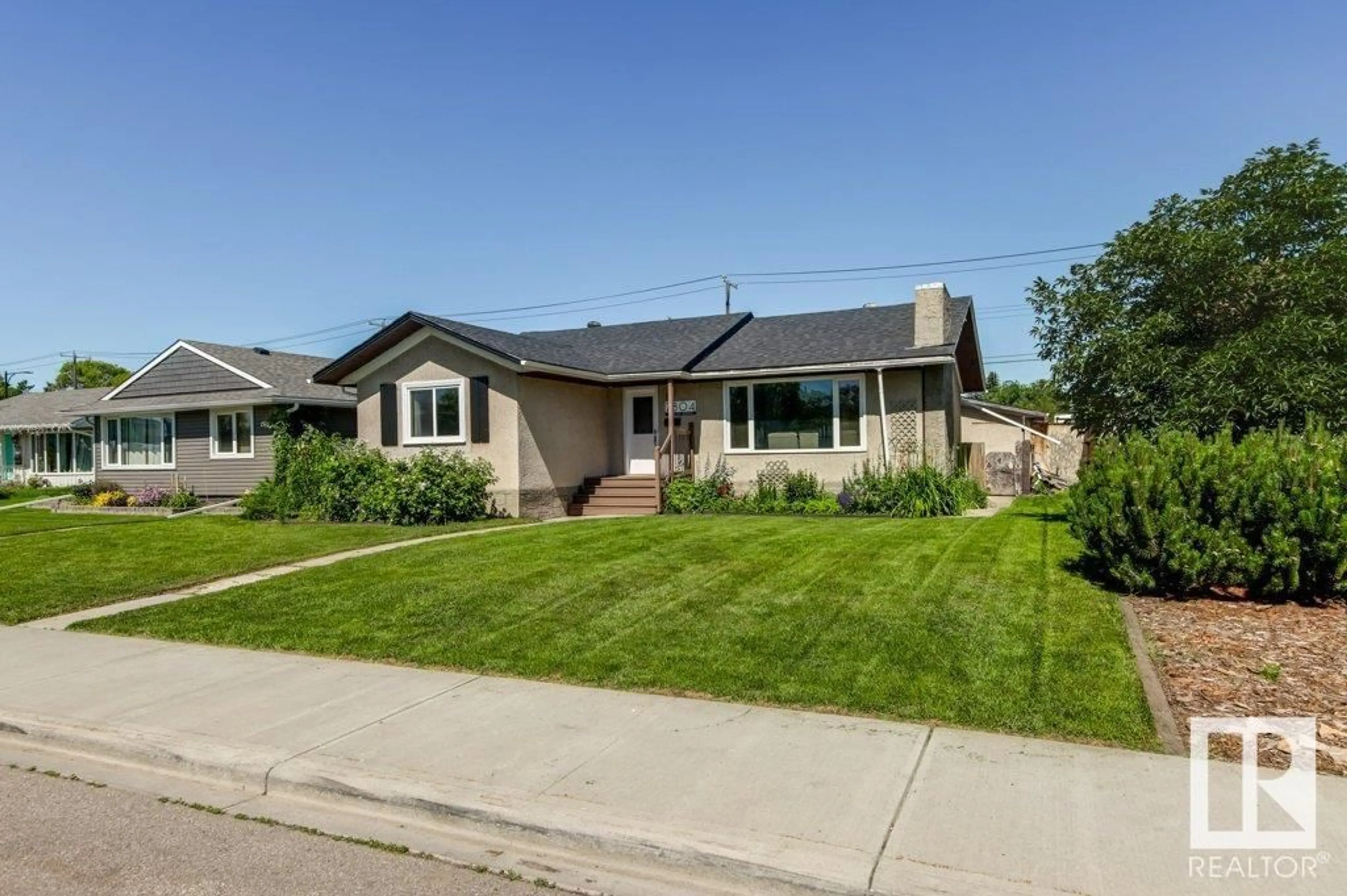 Home with vinyl exterior material, street for 7804 ARGYLL RD, Edmonton Alberta T6C4A8