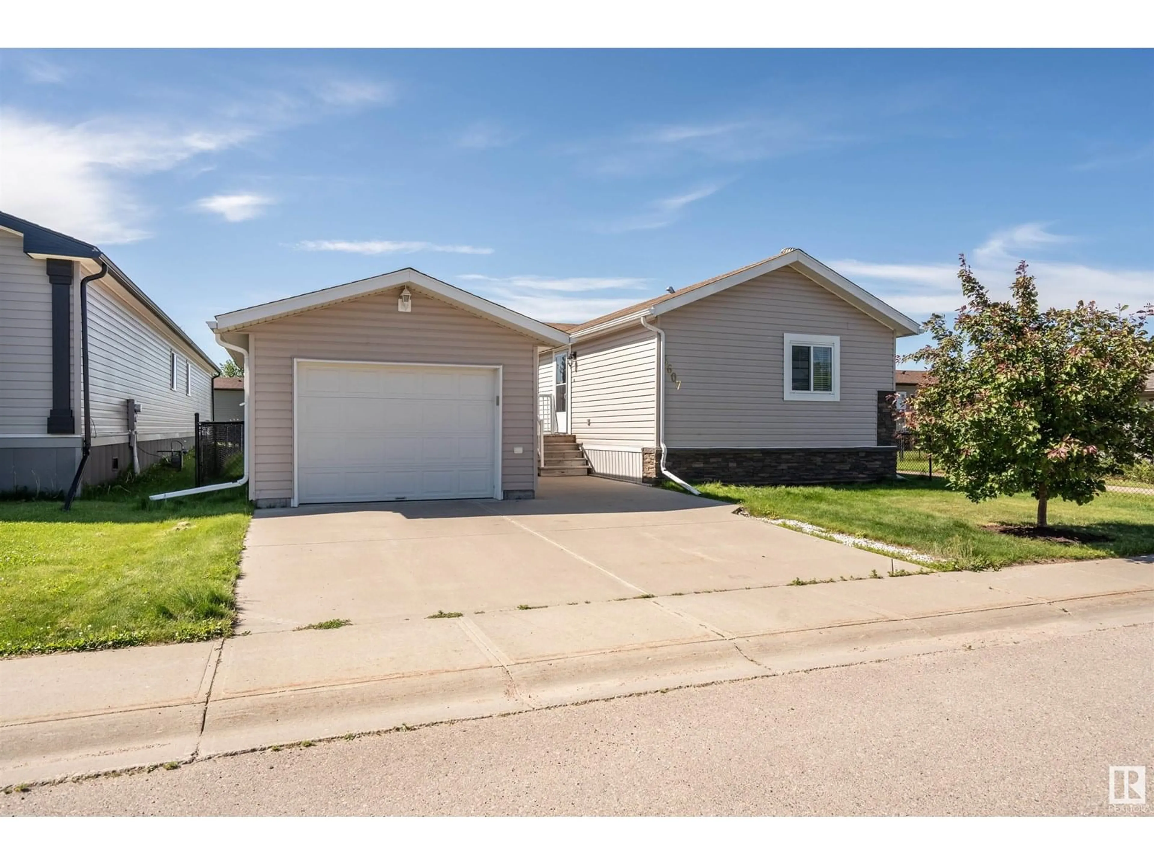 Home with vinyl exterior material, street for 4607 LABRADOR RD, Cold Lake Alberta T9M0C6