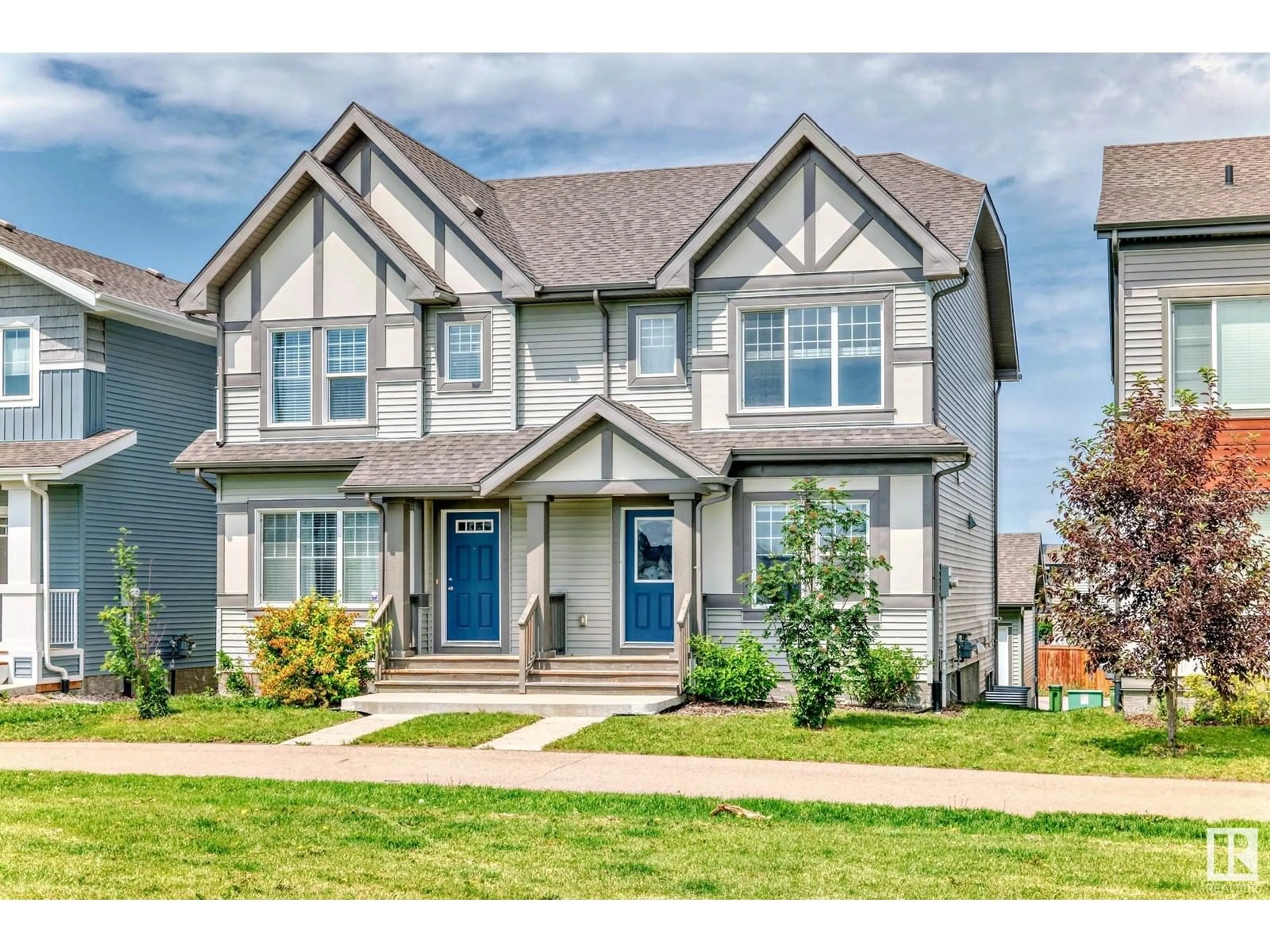 Home with vinyl exterior material, street for 2271 PRICE LN, Edmonton Alberta T6W3P9