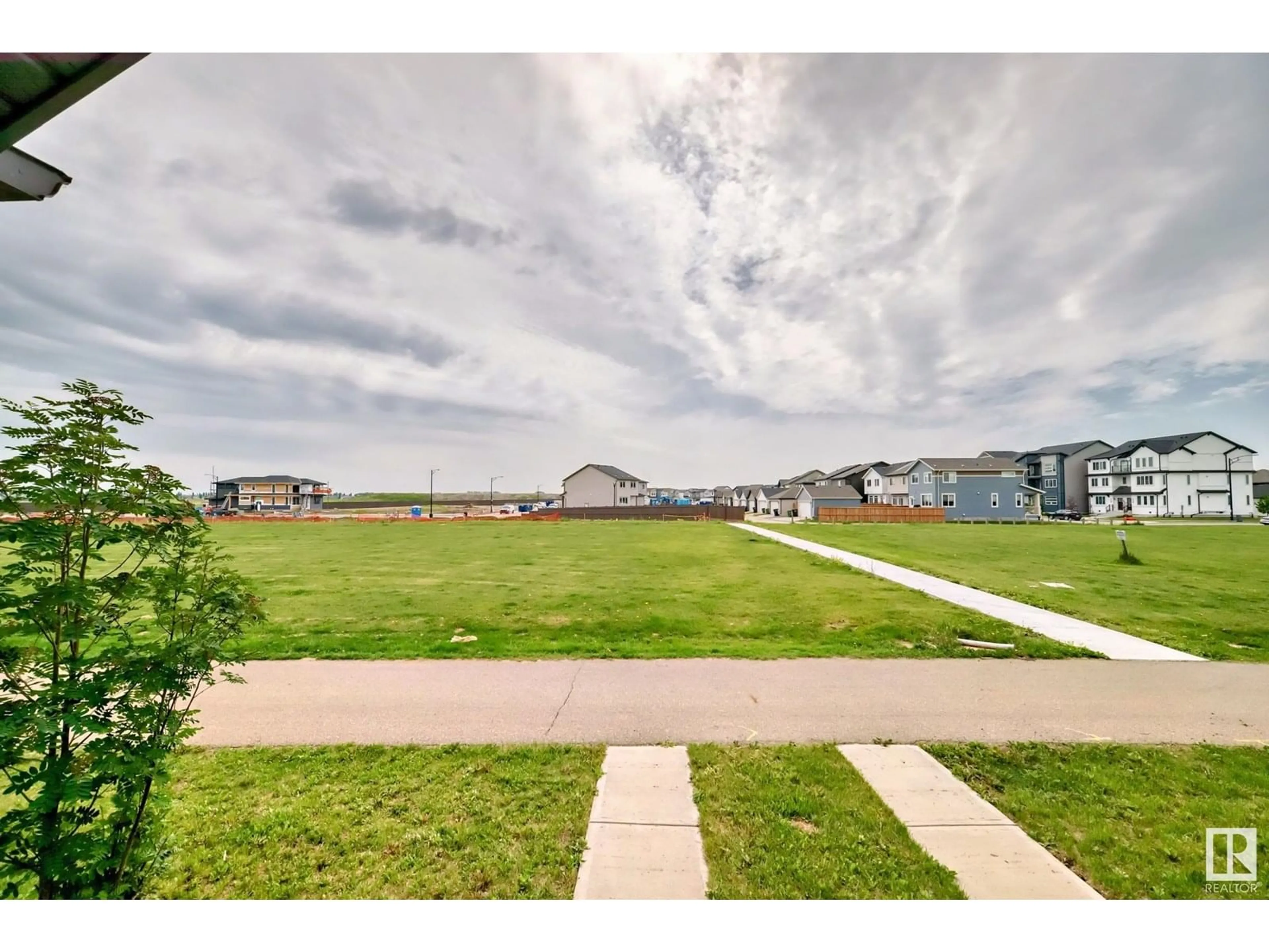 A pic from outside/outdoor area/front of a property/back of a property/a pic from drone, water/lake/river/ocean view for 2271 PRICE LN, Edmonton Alberta T6W3P9