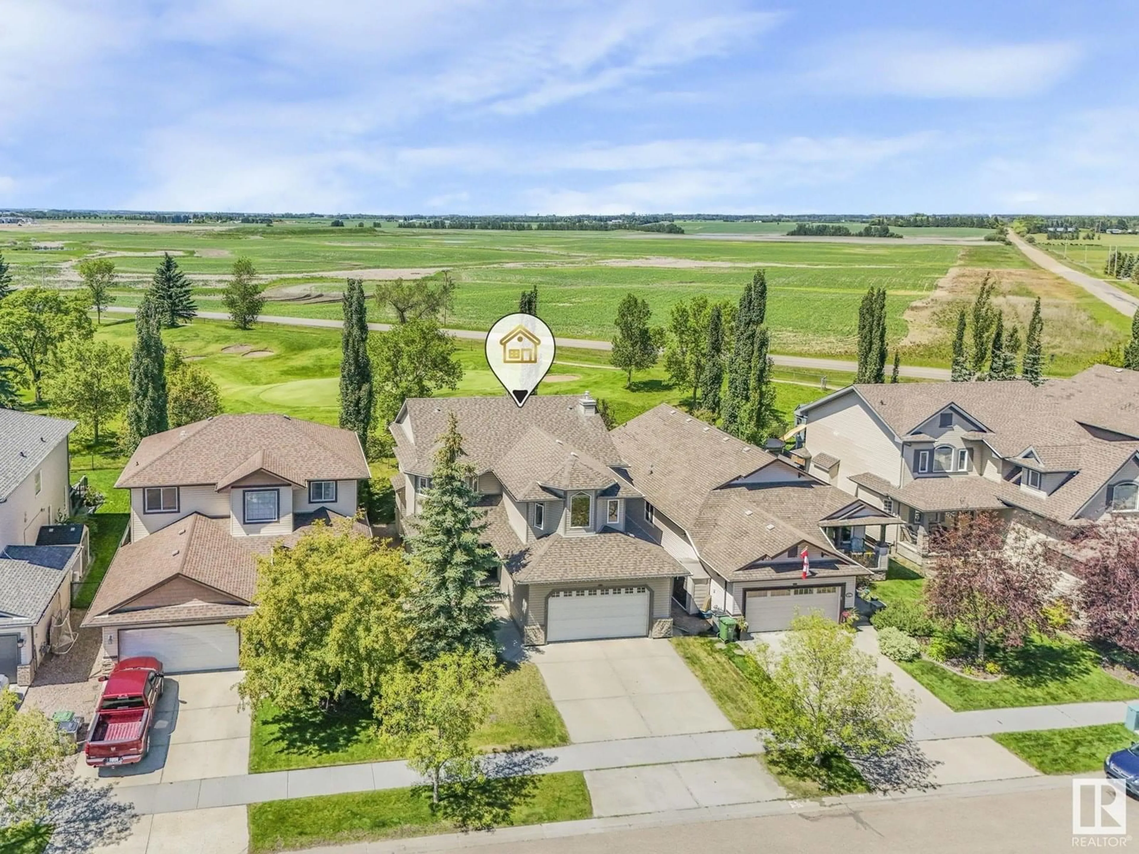 A pic from outside/outdoor area/front of a property/back of a property/a pic from drone, unknown for 106 RIDEAU CR, Beaumont Alberta T4X0B9