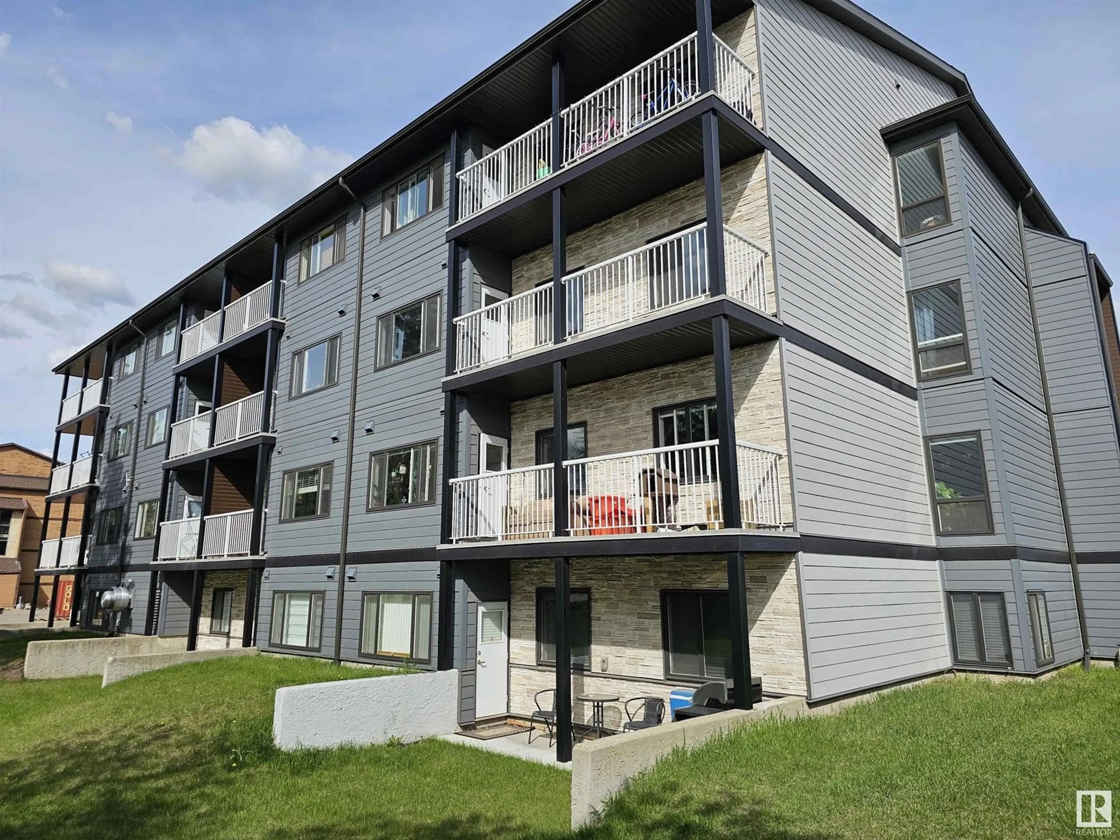 A pic from outside/outdoor area/front of a property/back of a property/a pic from drone, building for 407 - 14808 26 ST, Edmonton Alberta T5Y2G4