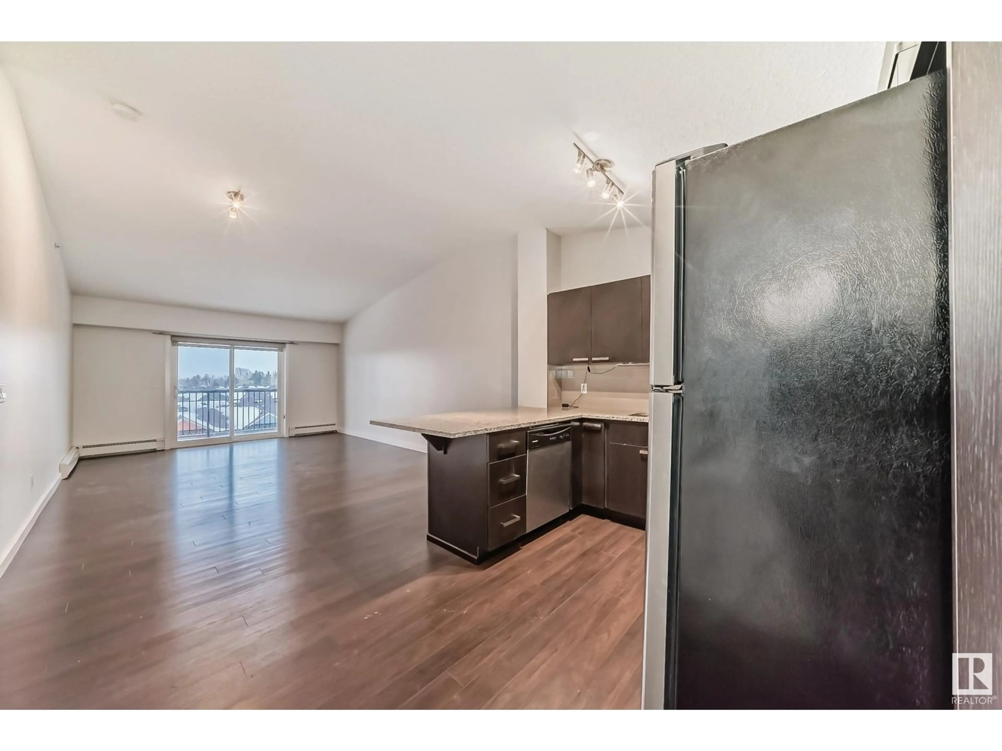 Open concept kitchen, unknown for #406 - 14808 125 ST, Edmonton Alberta T5X0G1