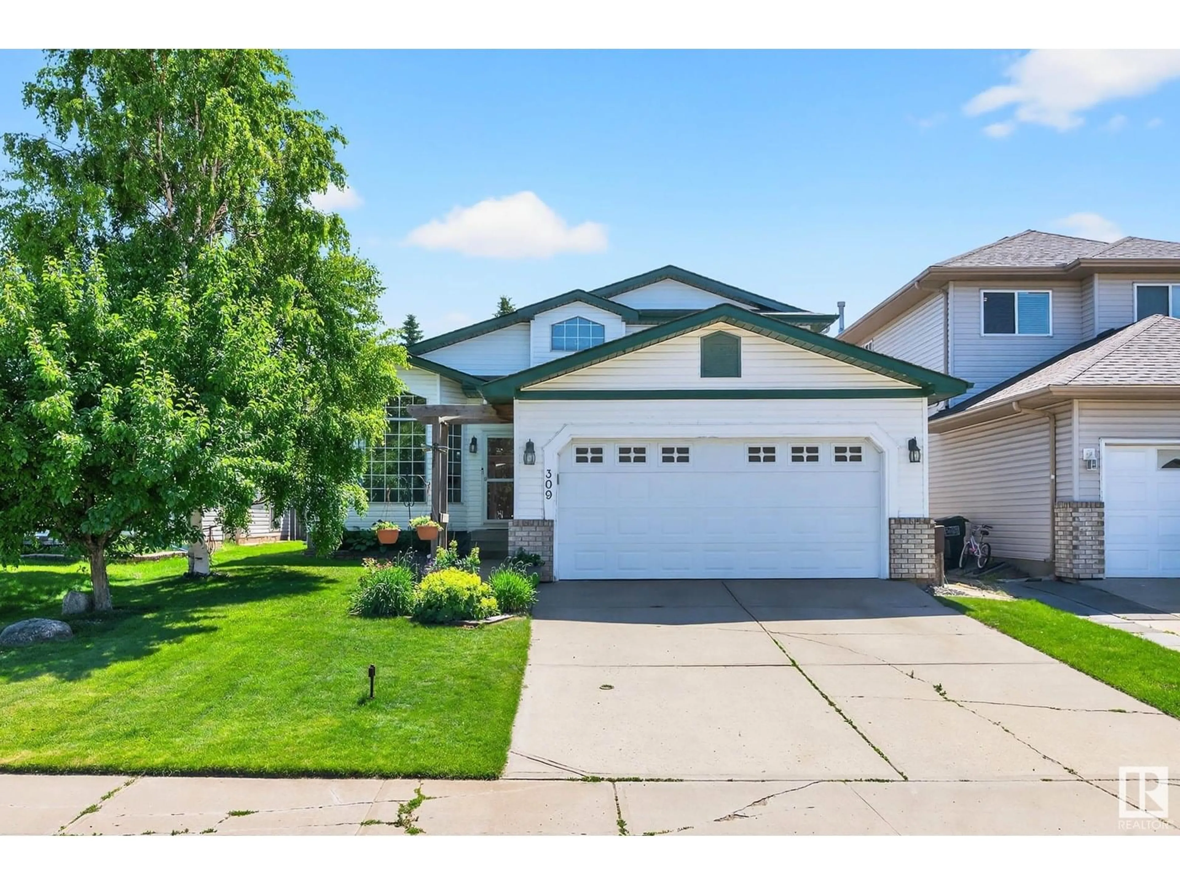 Home with vinyl exterior material, street for 309 JILLINGS CR, Edmonton Alberta T6L6N1