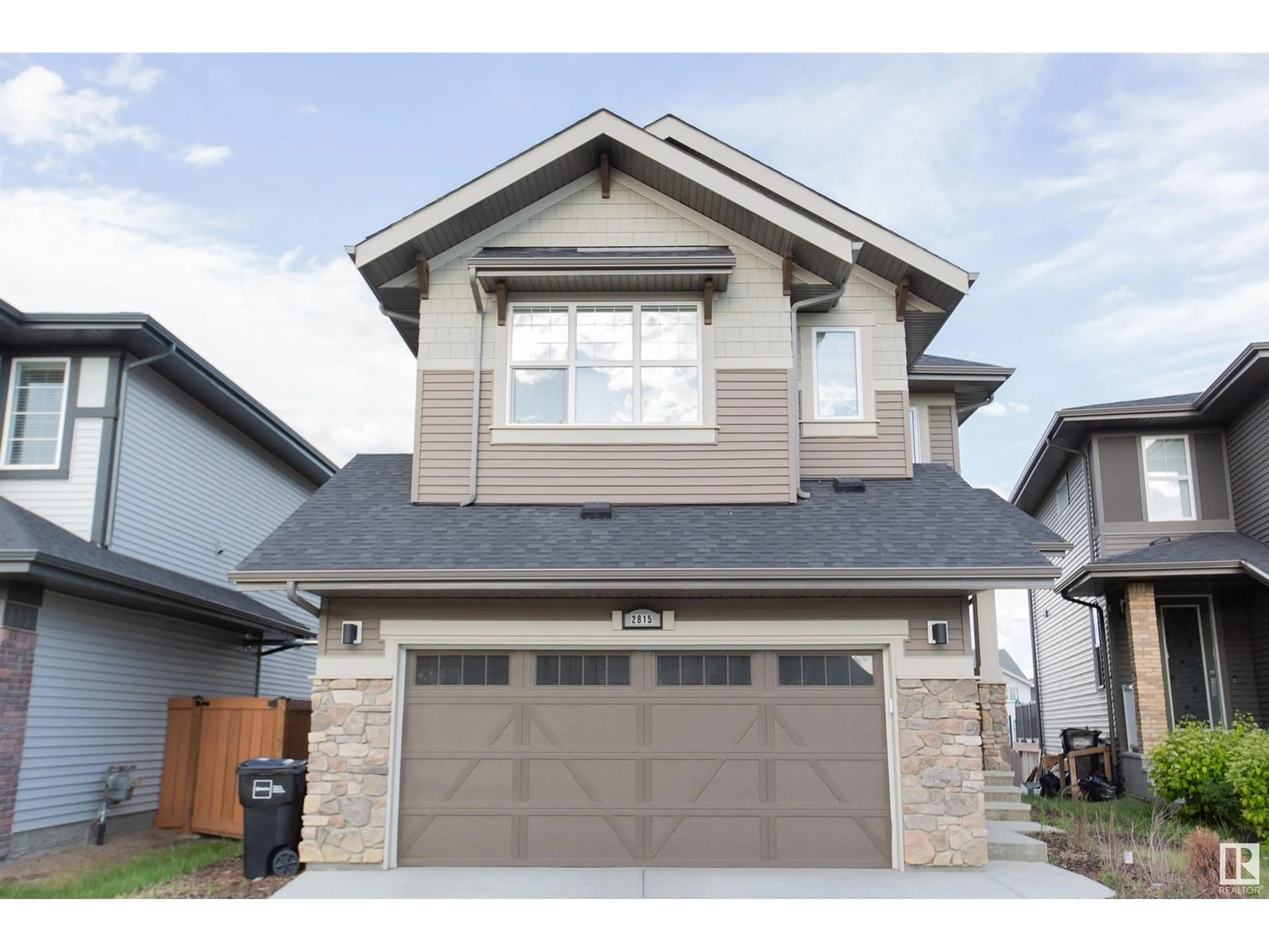 Home with vinyl exterior material, street for NW - 2815 200 ST, Edmonton Alberta T6M0W8