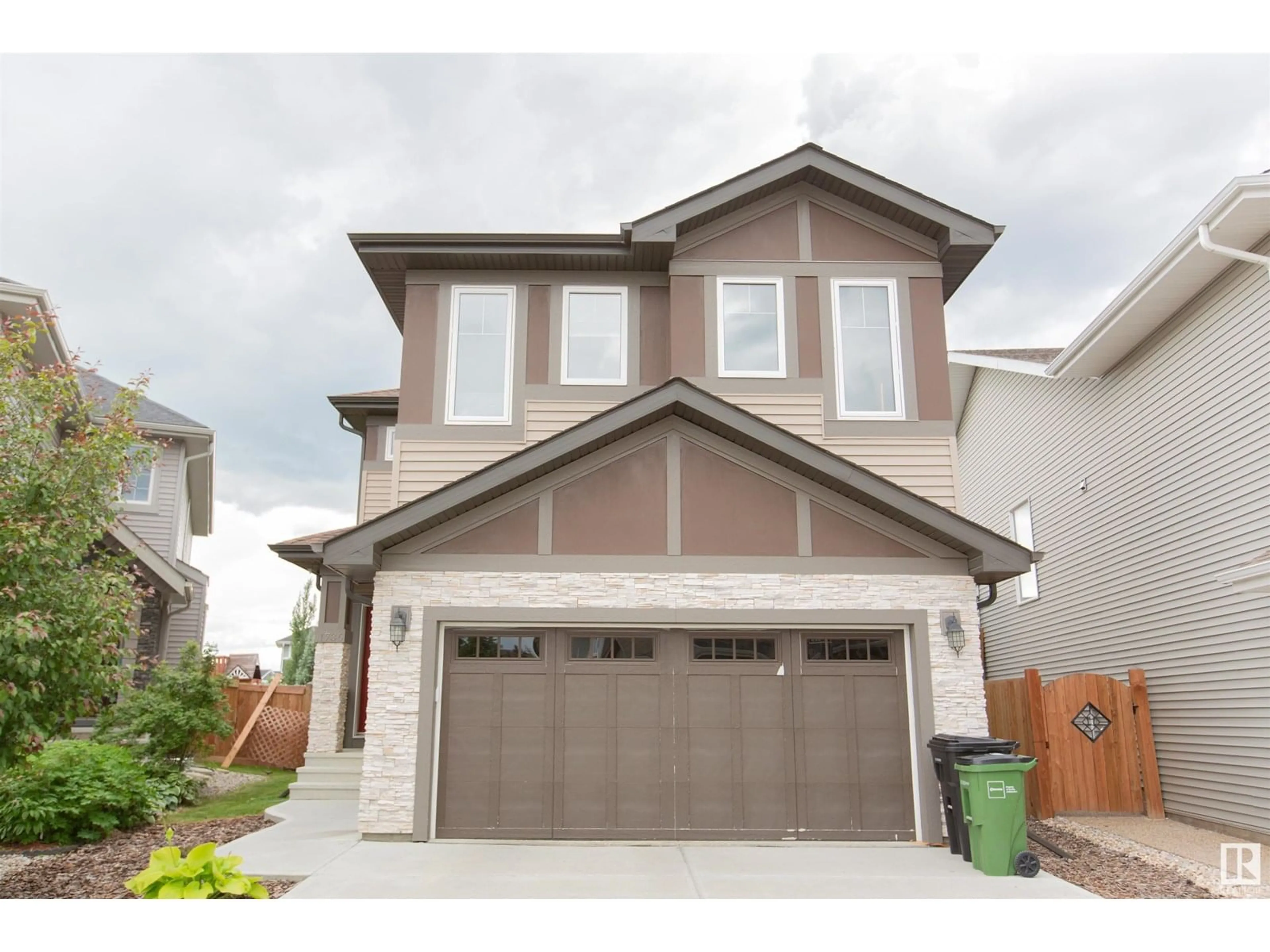 Home with vinyl exterior material, street for SW - 1736 162 ST, Edmonton Alberta T6W3E8