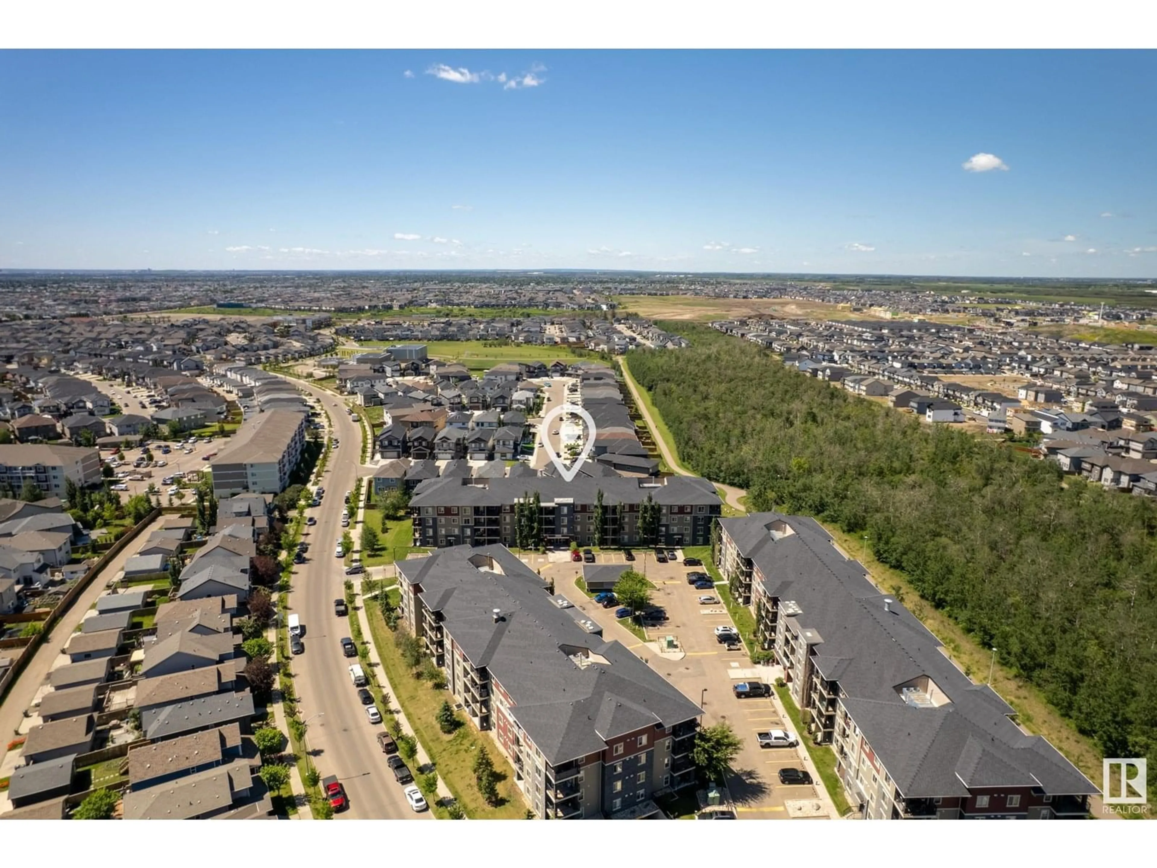 A pic from outside/outdoor area/front of a property/back of a property/a pic from drone, unknown for 404 - 1060 MCCONACHIE BV, Edmonton Alberta T5Y0W9