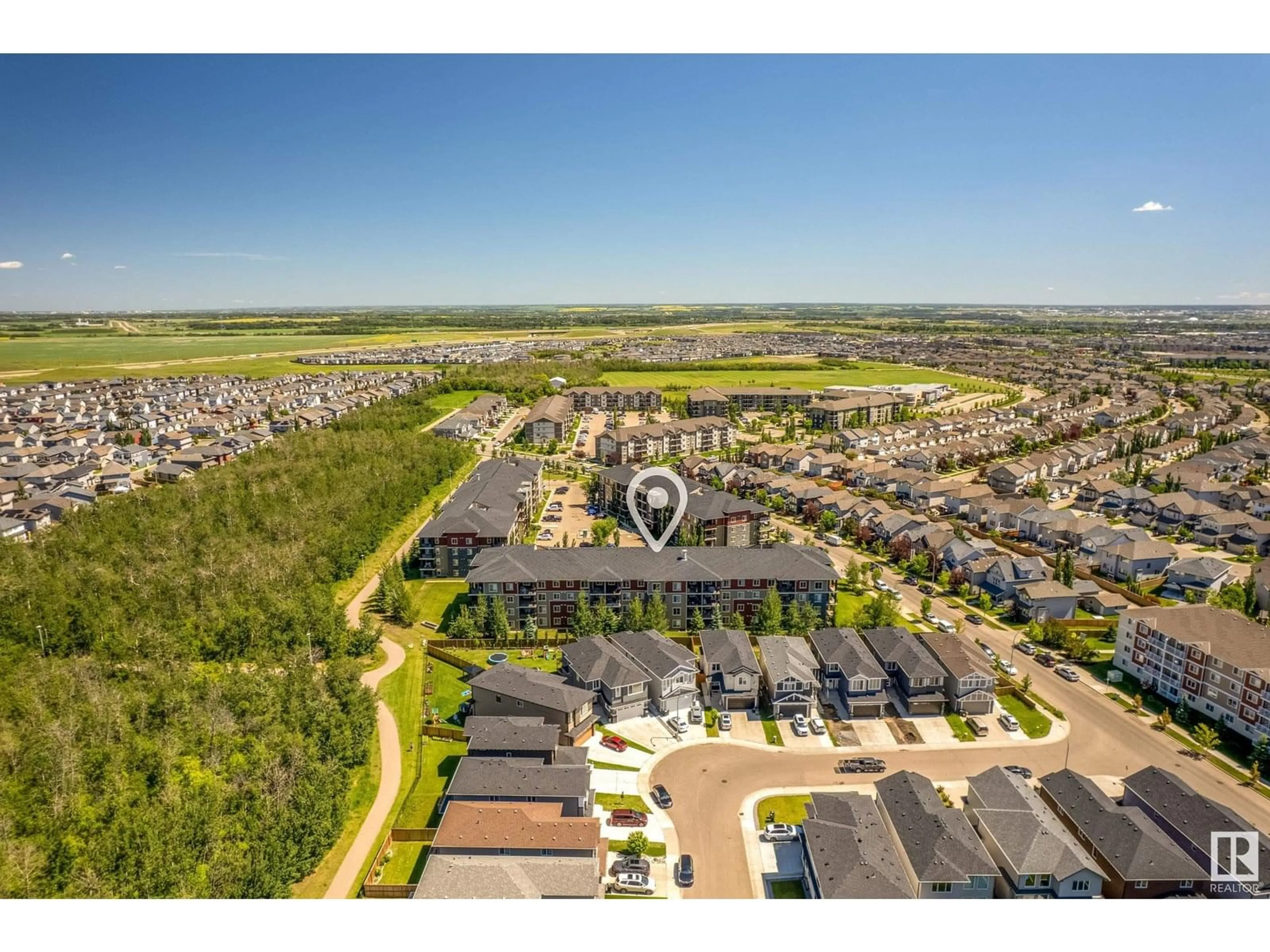 A pic from outside/outdoor area/front of a property/back of a property/a pic from drone, street for 404 - 1060 MCCONACHIE BV, Edmonton Alberta T5Y0W9