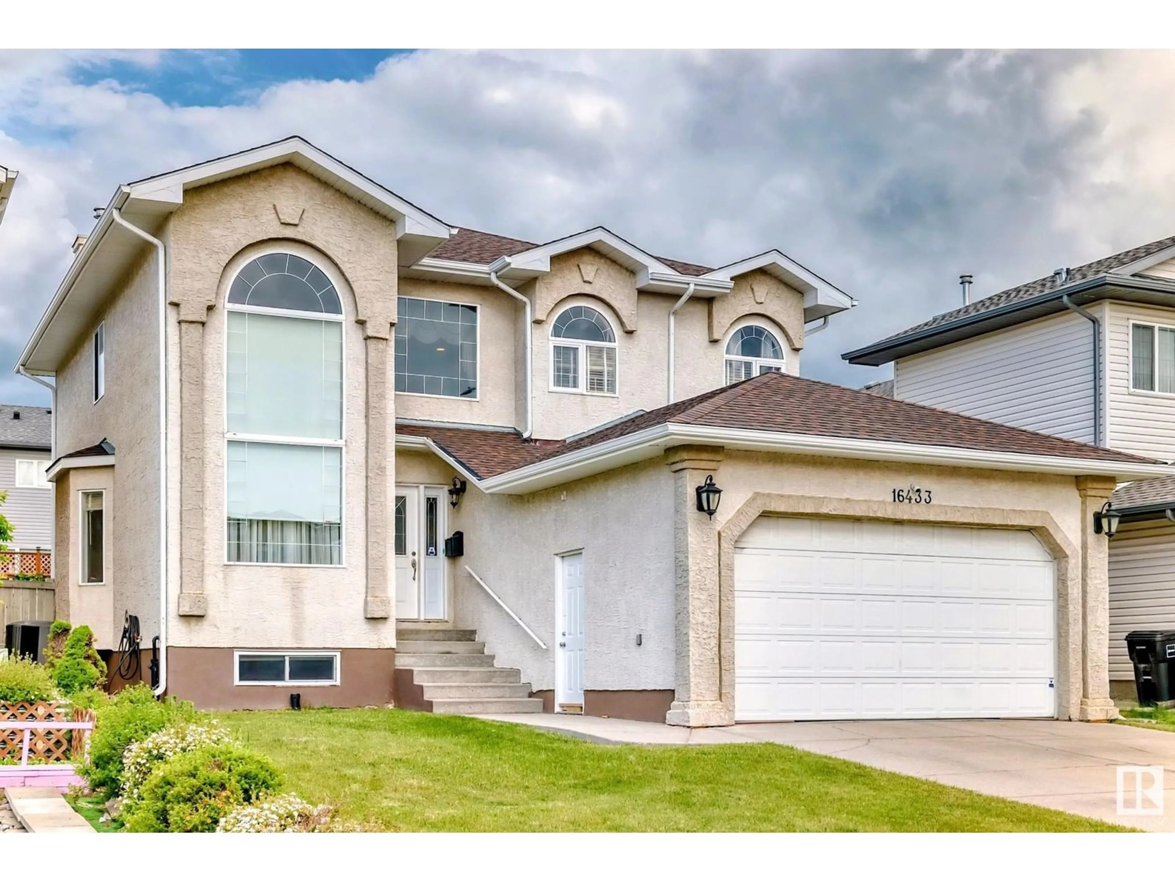 Home with vinyl exterior material, street for NW - 16433 61A ST, Edmonton Alberta T5Y3N2