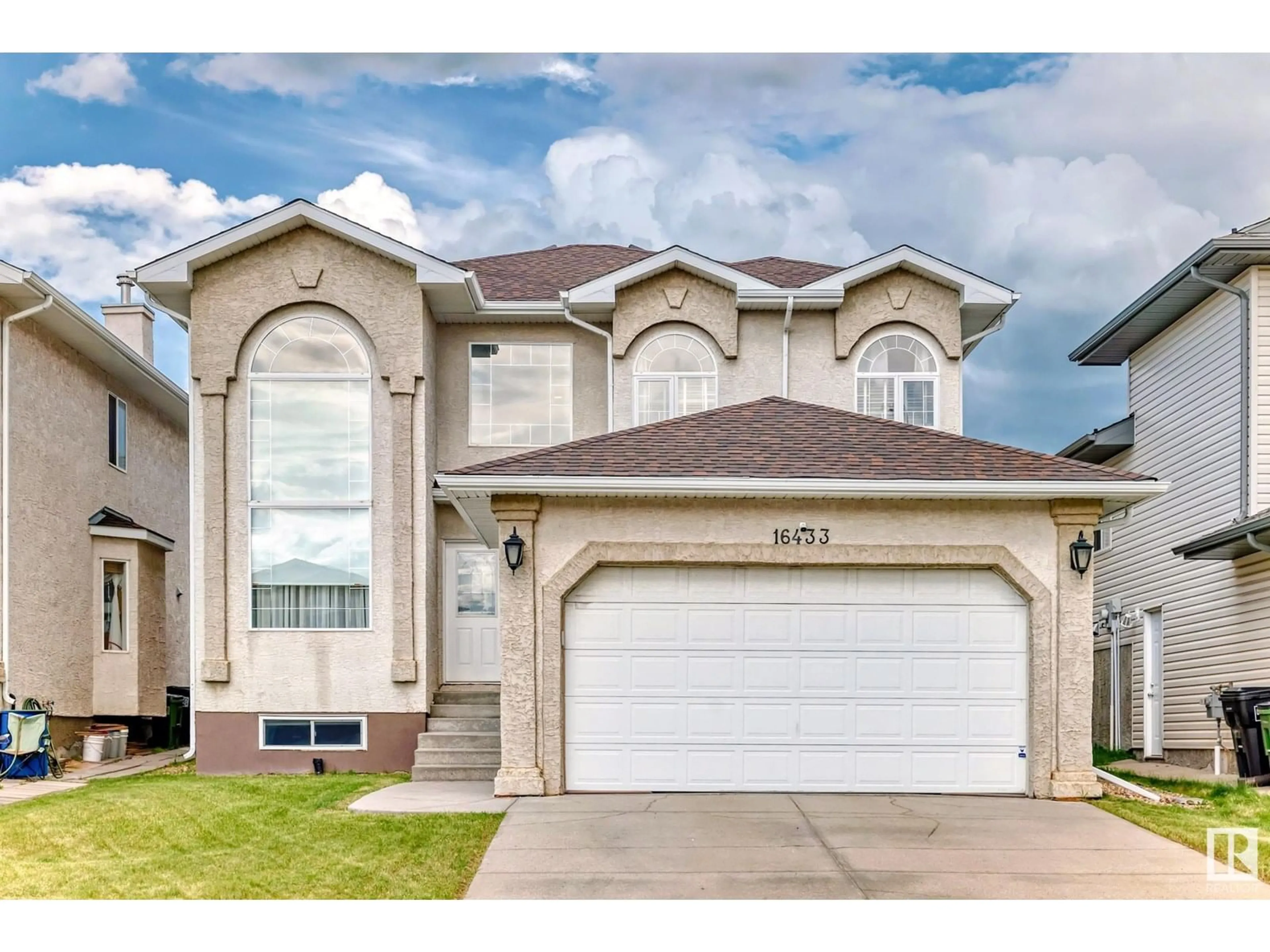 Home with vinyl exterior material, street for NW - 16433 61A ST, Edmonton Alberta T5Y3N2