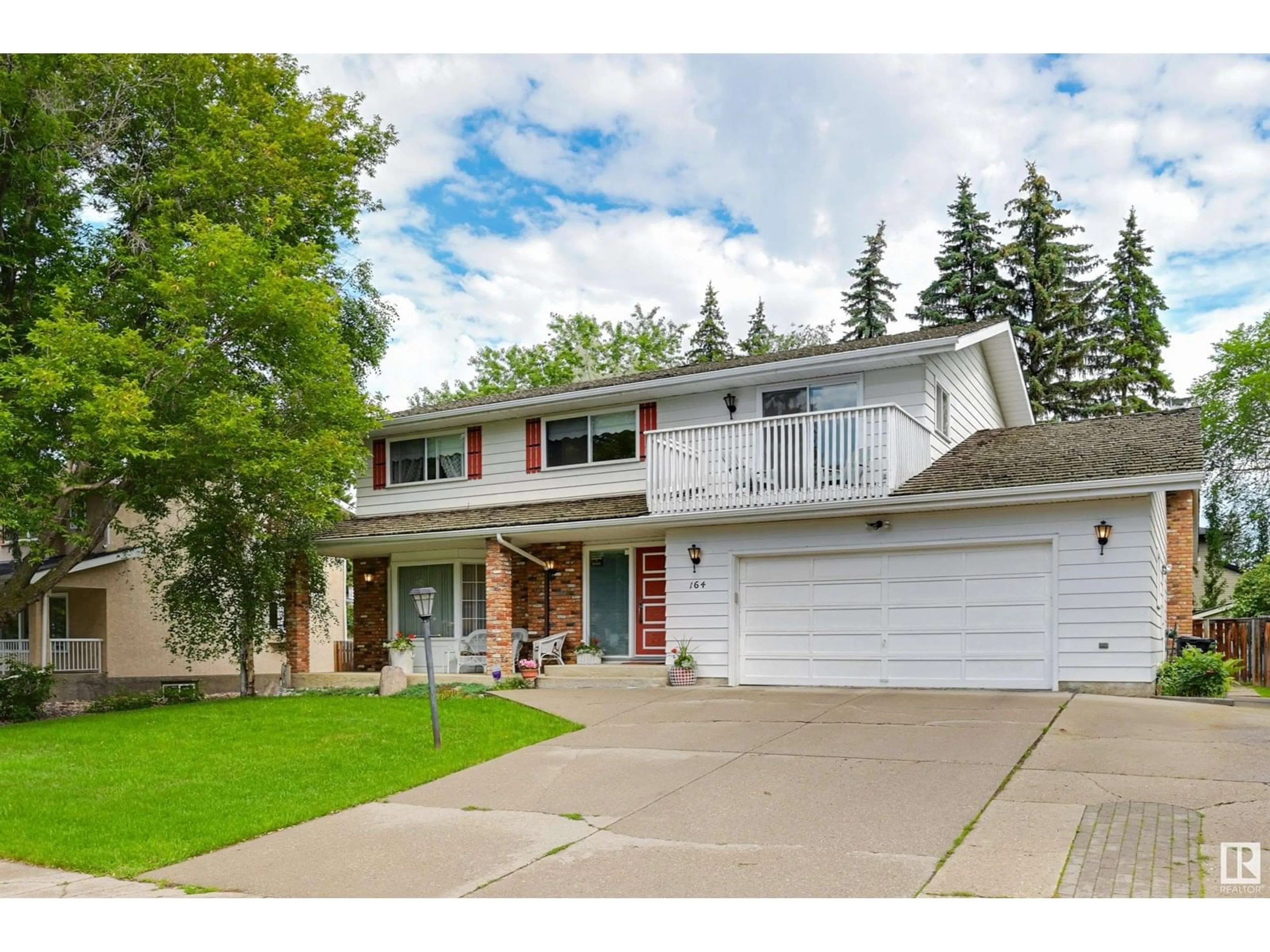 Home with vinyl exterior material, street for 164 QUESNELL CR, Edmonton Alberta T5R5P3