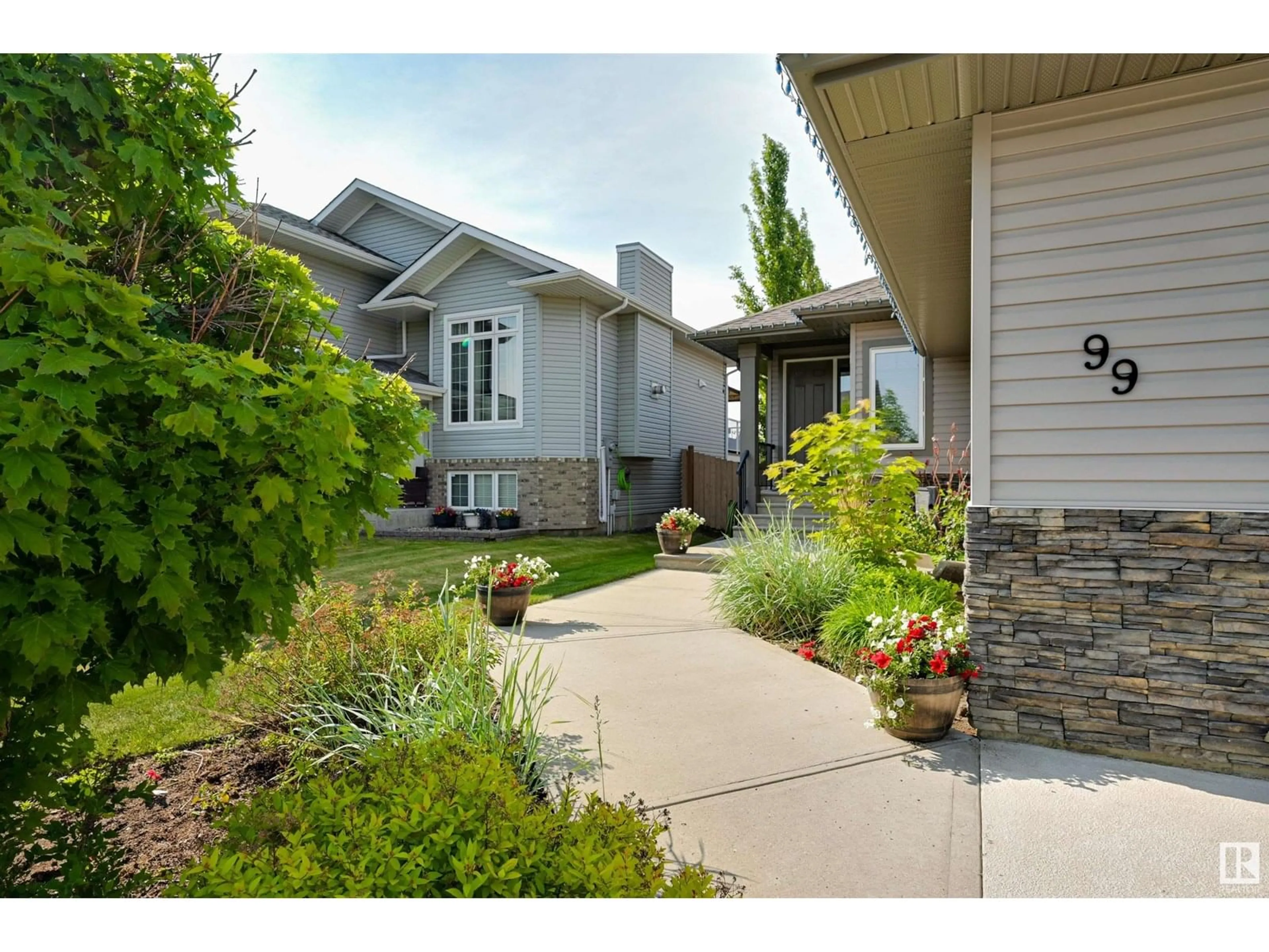 Home with vinyl exterior material, street for 99 WALTERS PL, Leduc Alberta T9E0G3