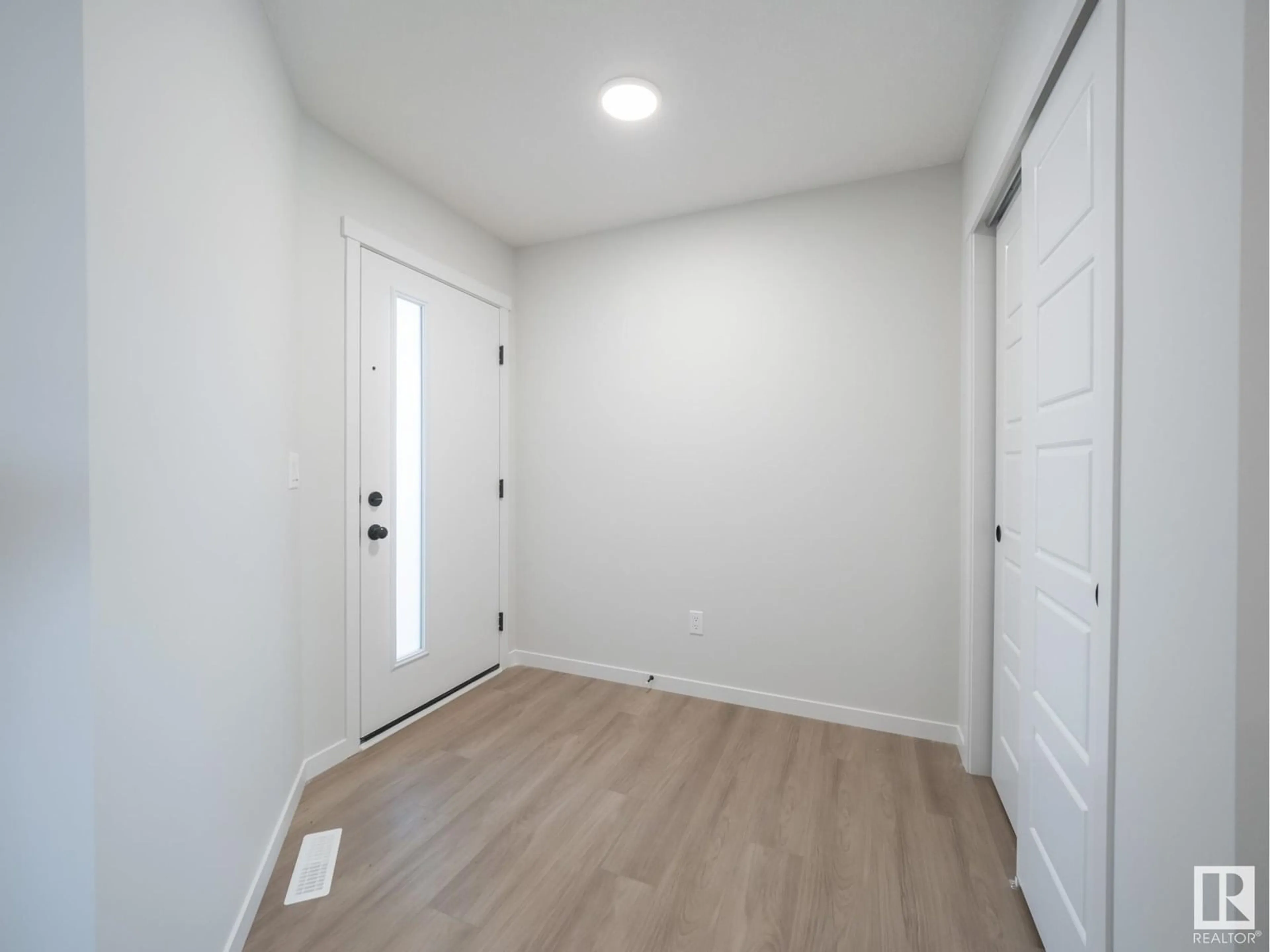 Indoor entryway for 20527 24 AV, Edmonton Alberta T6M1N6
