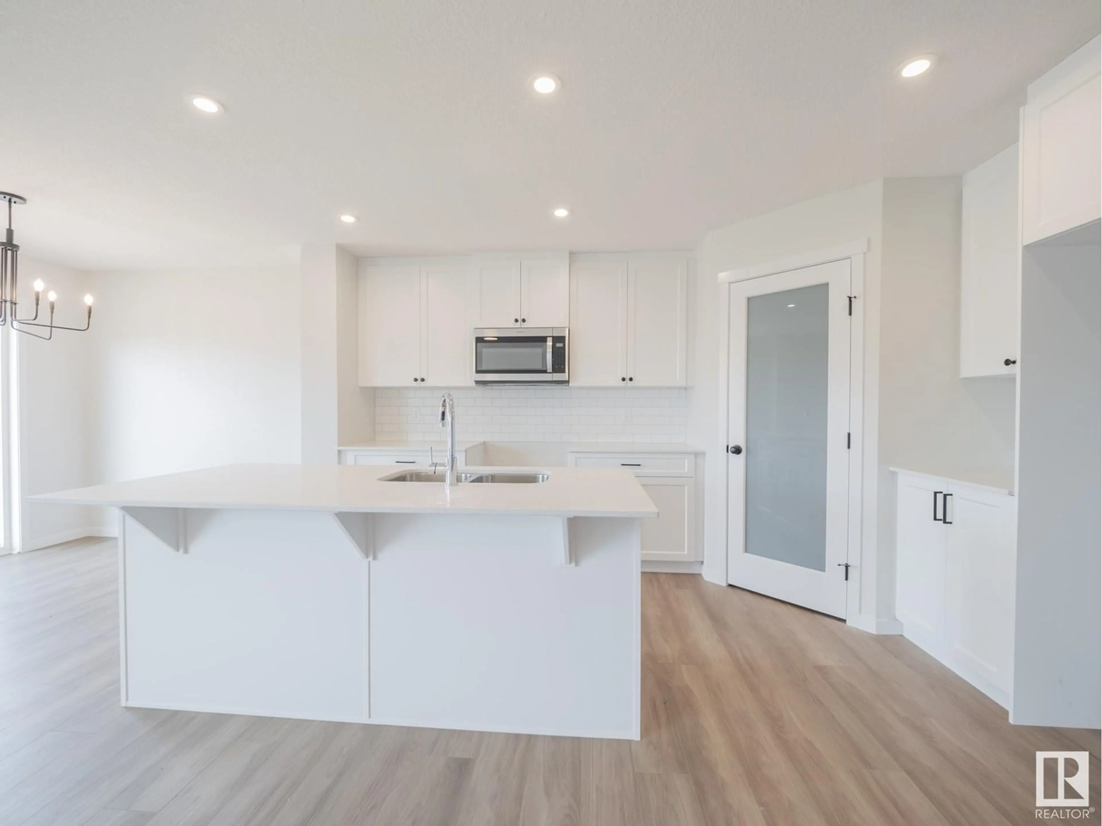 Open concept kitchen, unknown for 20527 24 AV, Edmonton Alberta T6M1N6