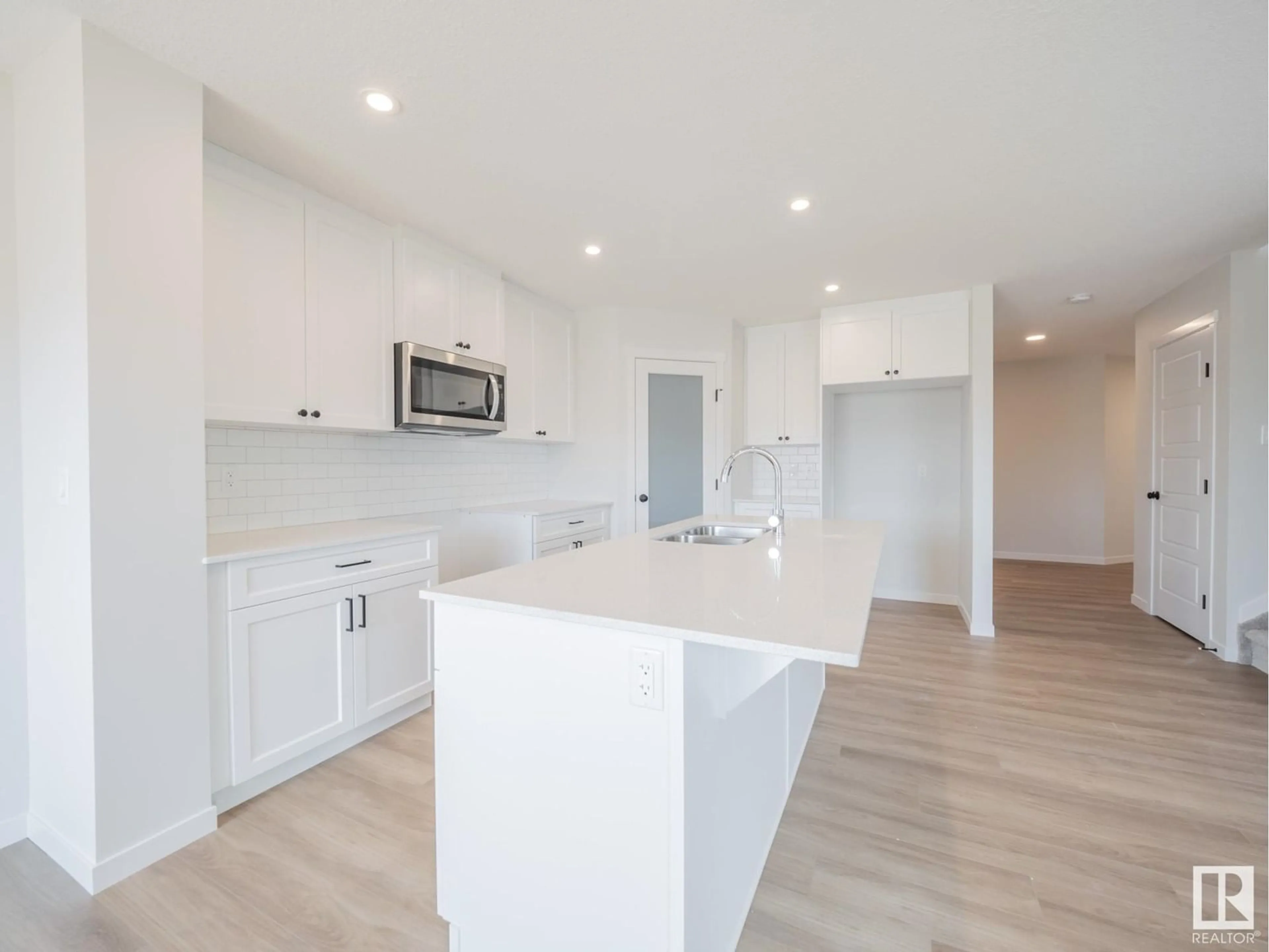 Open concept kitchen, unknown for 20527 24 AV, Edmonton Alberta T6M1N6