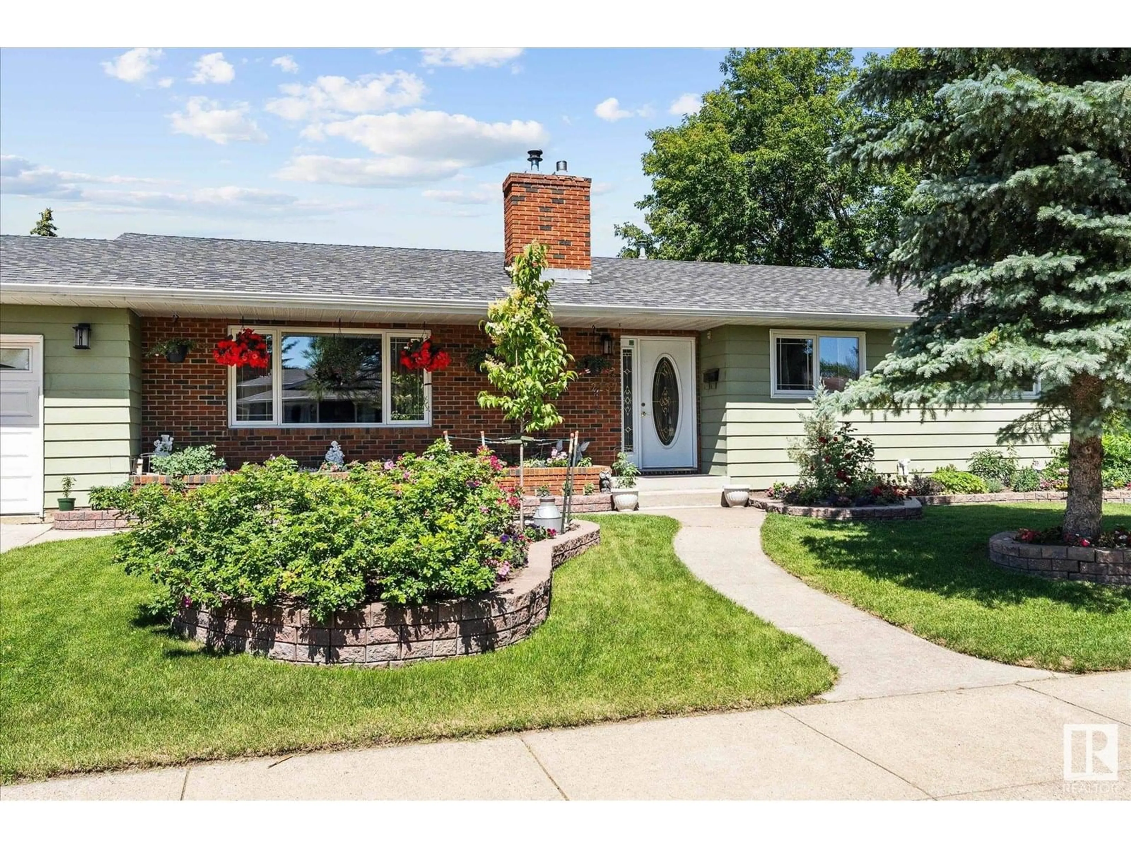 Home with brick exterior material, street for NW - 2137 85 ST, Edmonton Alberta T6K2G1