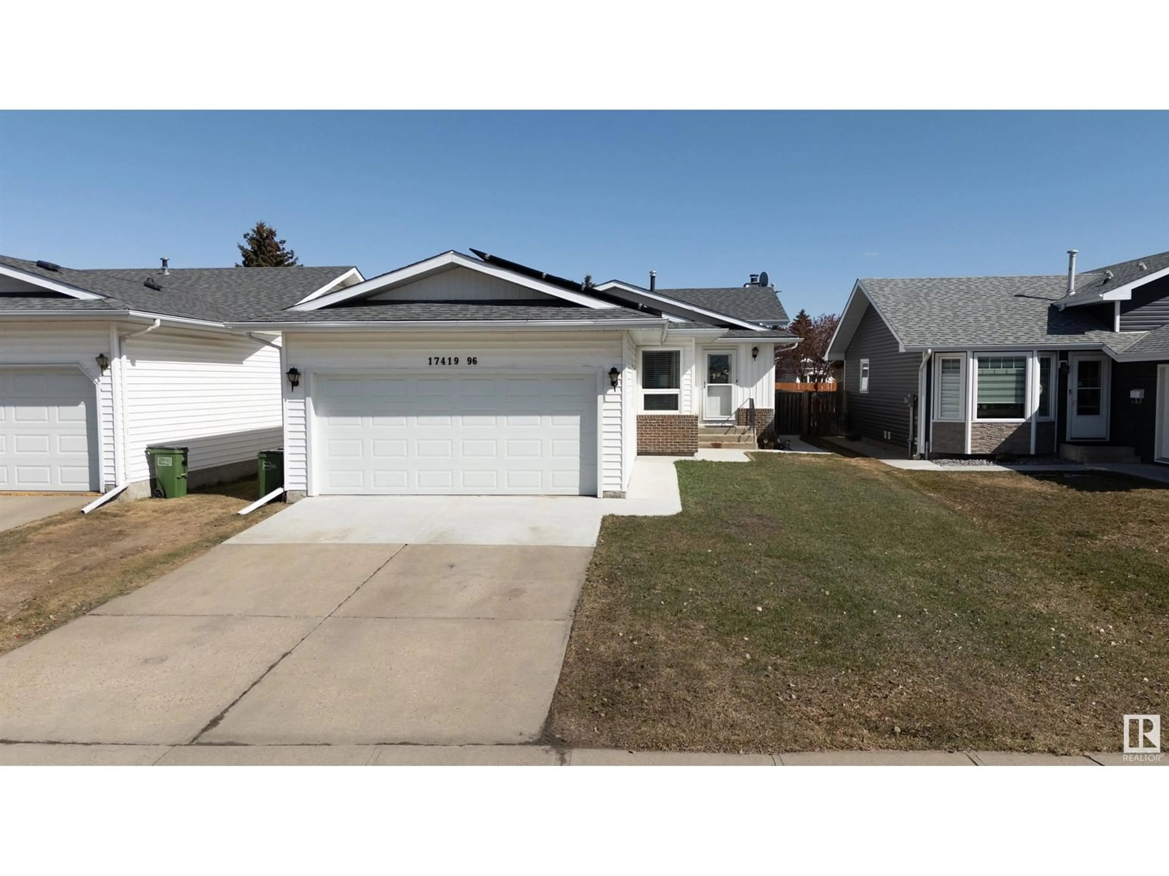 Home with vinyl exterior material, street for 17419 96 ST, Edmonton Alberta T5Z2B5