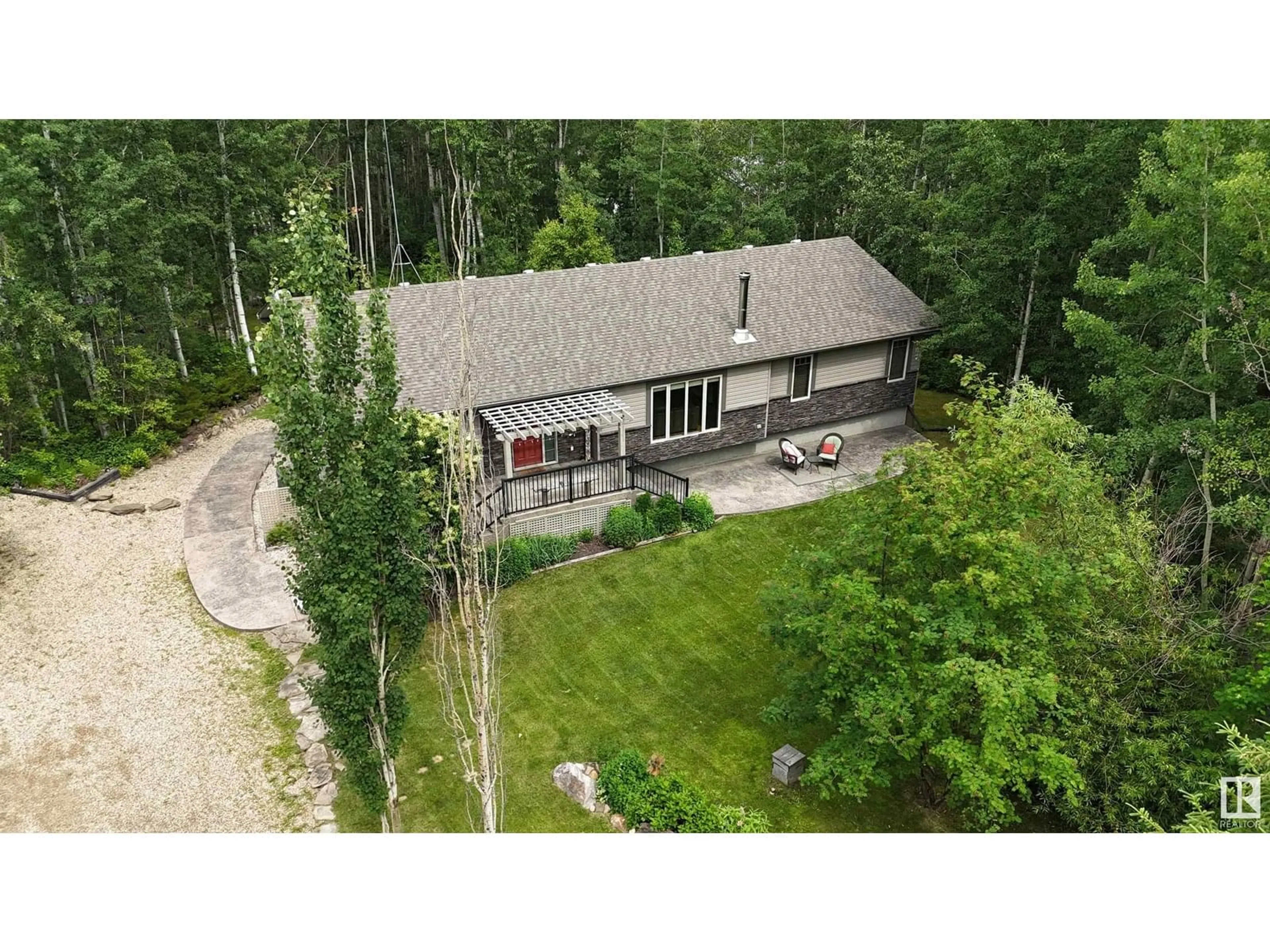 A pic from outside/outdoor area/front of a property/back of a property/a pic from drone, forest/trees view for 462014 RGE ROAD 10, Rural Wetaskiwin County Alberta T0C2V0