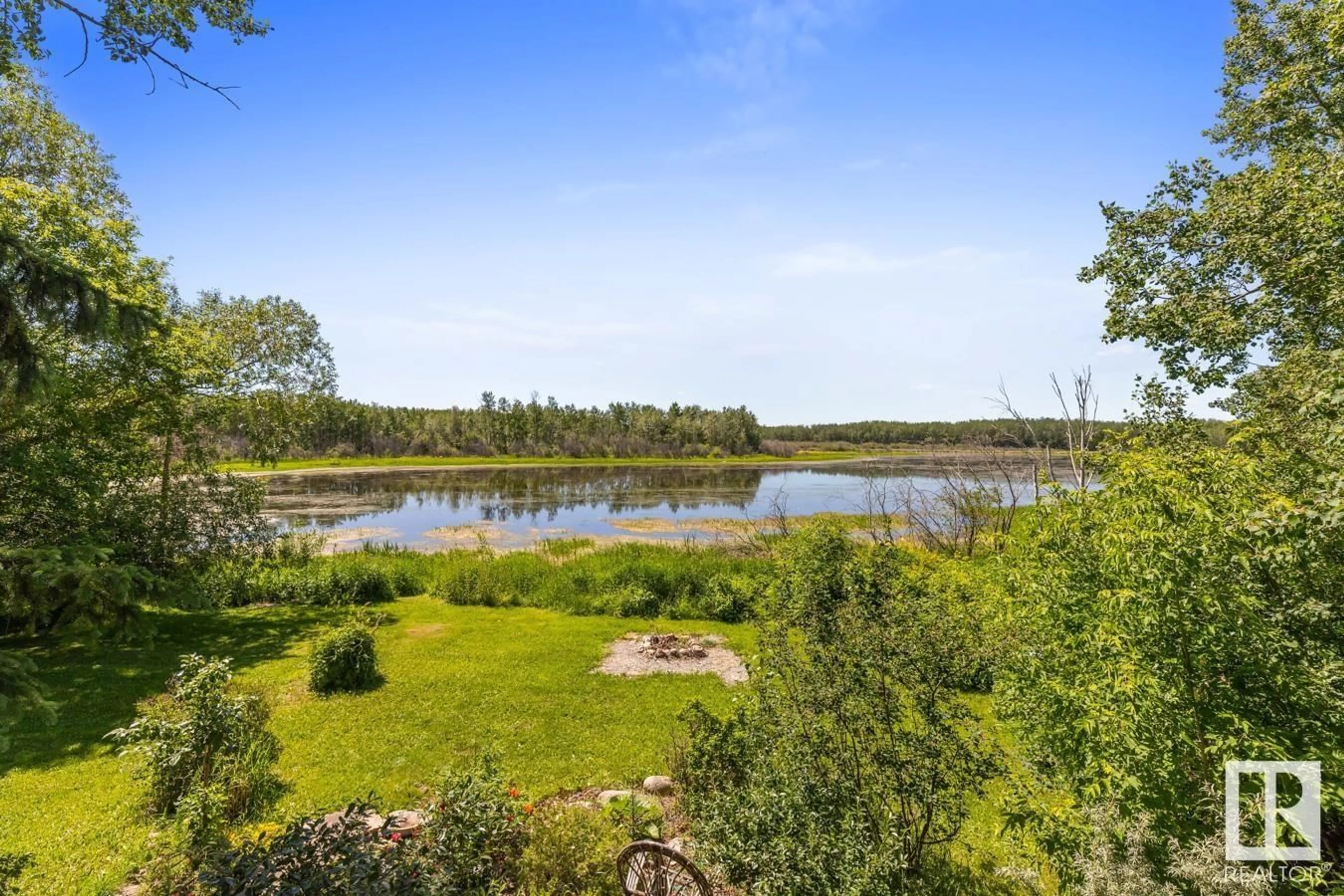 A pic from outside/outdoor area/front of a property/back of a property/a pic from drone, water/lake/river/ocean view for 52343 - 259 RGE ROAD 211, Rural Strathcona County Alberta T8G1A6