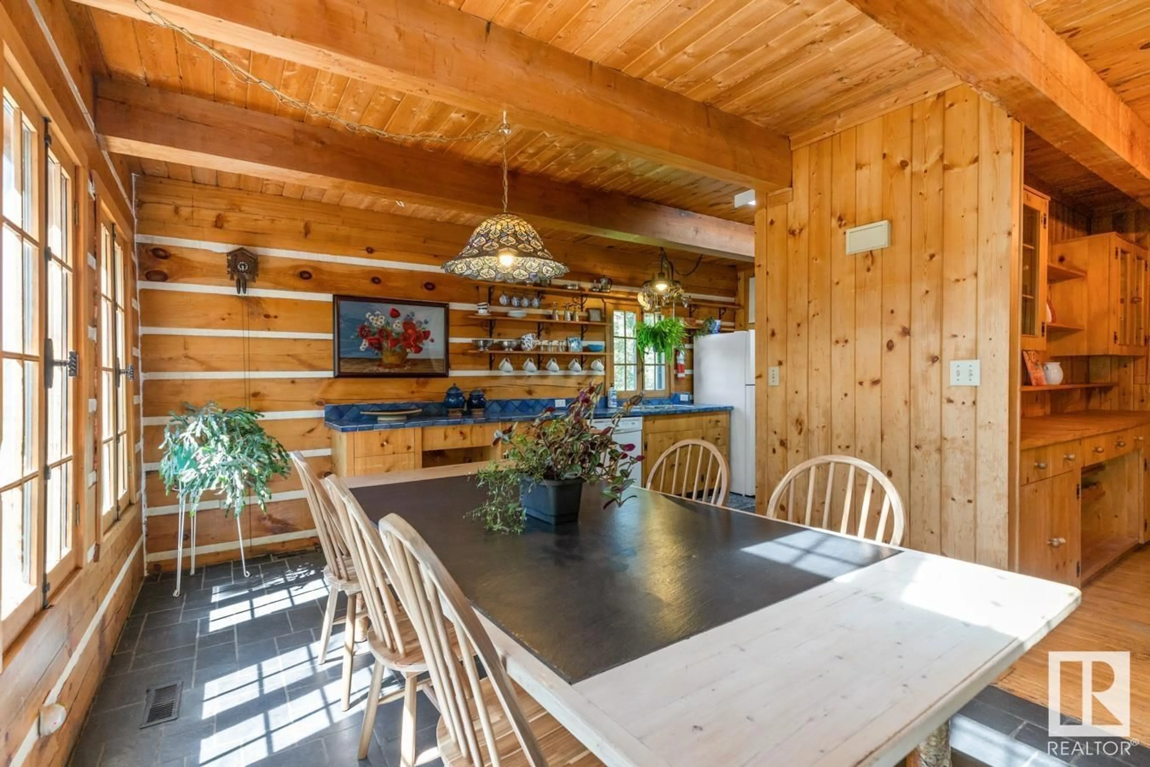 Dining room, wood/laminate floor for 52343 - 259 RGE ROAD 211, Rural Strathcona County Alberta T8G1A6