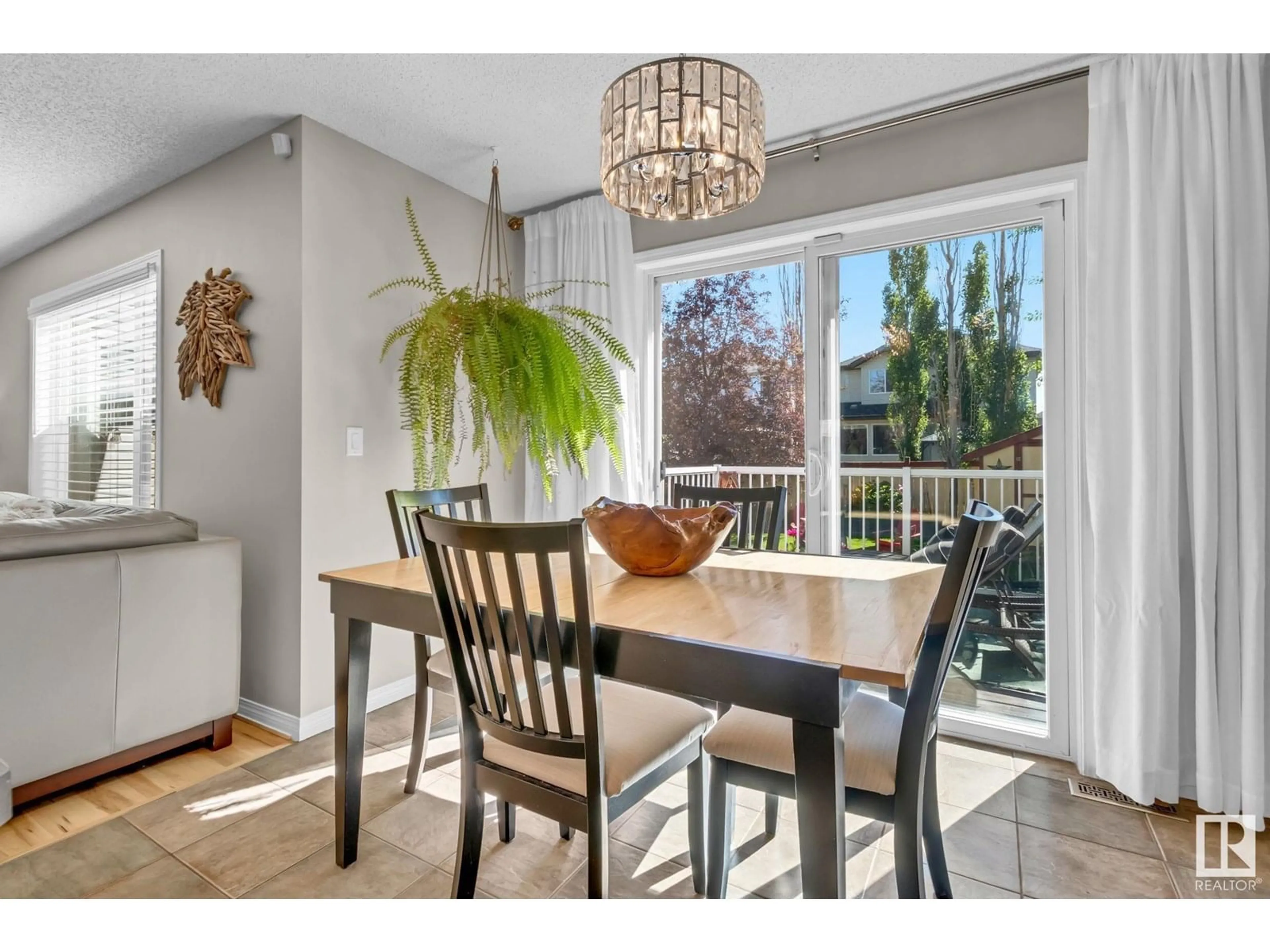 Dining room, wood/laminate floor for 303 SOUTHWICK BV, Leduc Alberta T9E0E8