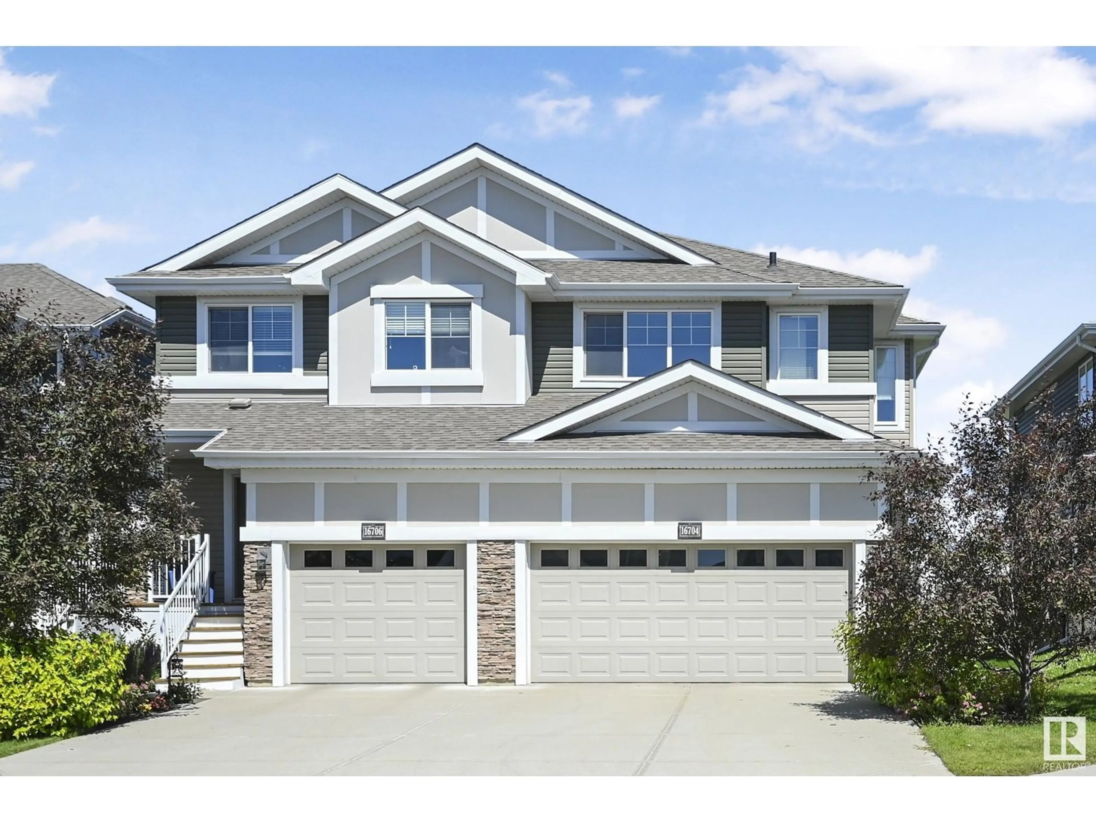 Home with vinyl exterior material, street for 16704 14 AV, Edmonton Alberta T6W3C3
