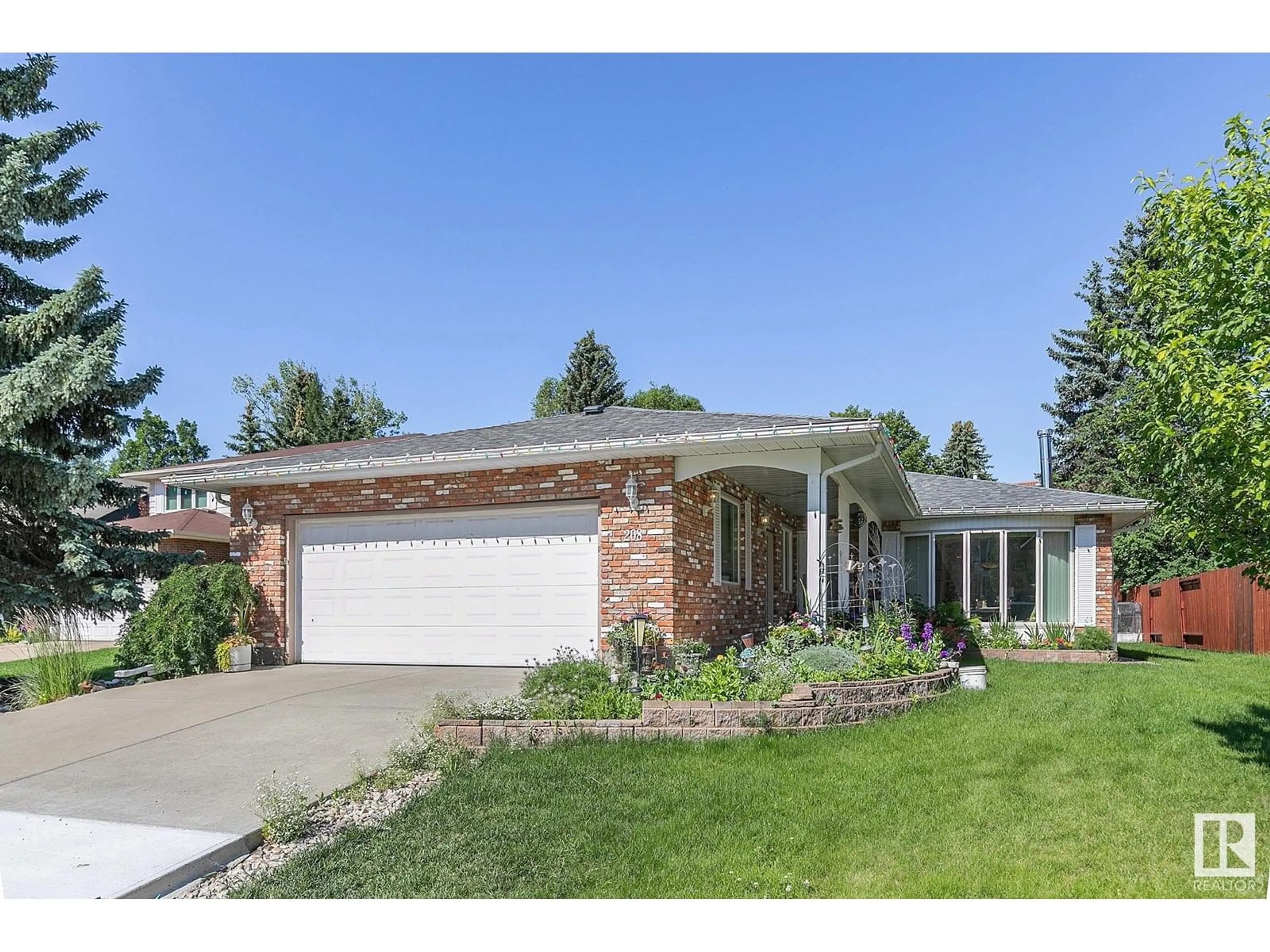 Home with brick exterior material, street for 208 GARIEPY CR, Edmonton Alberta T6M1A2