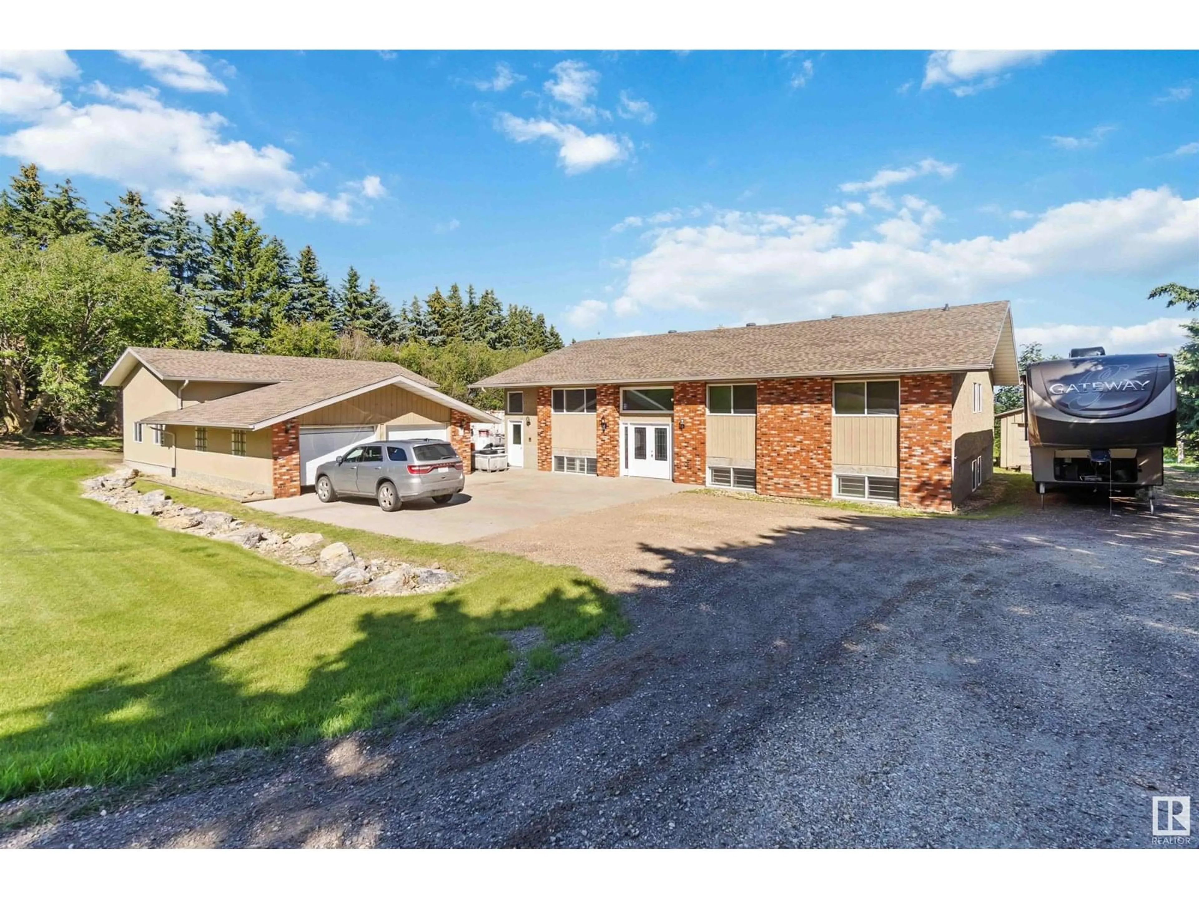 A pic from outside/outdoor area/front of a property/back of a property/a pic from drone, unknown for 23 - 55305 RGE ROAD 242, Rural Sturgeon County Alberta T5E5S7