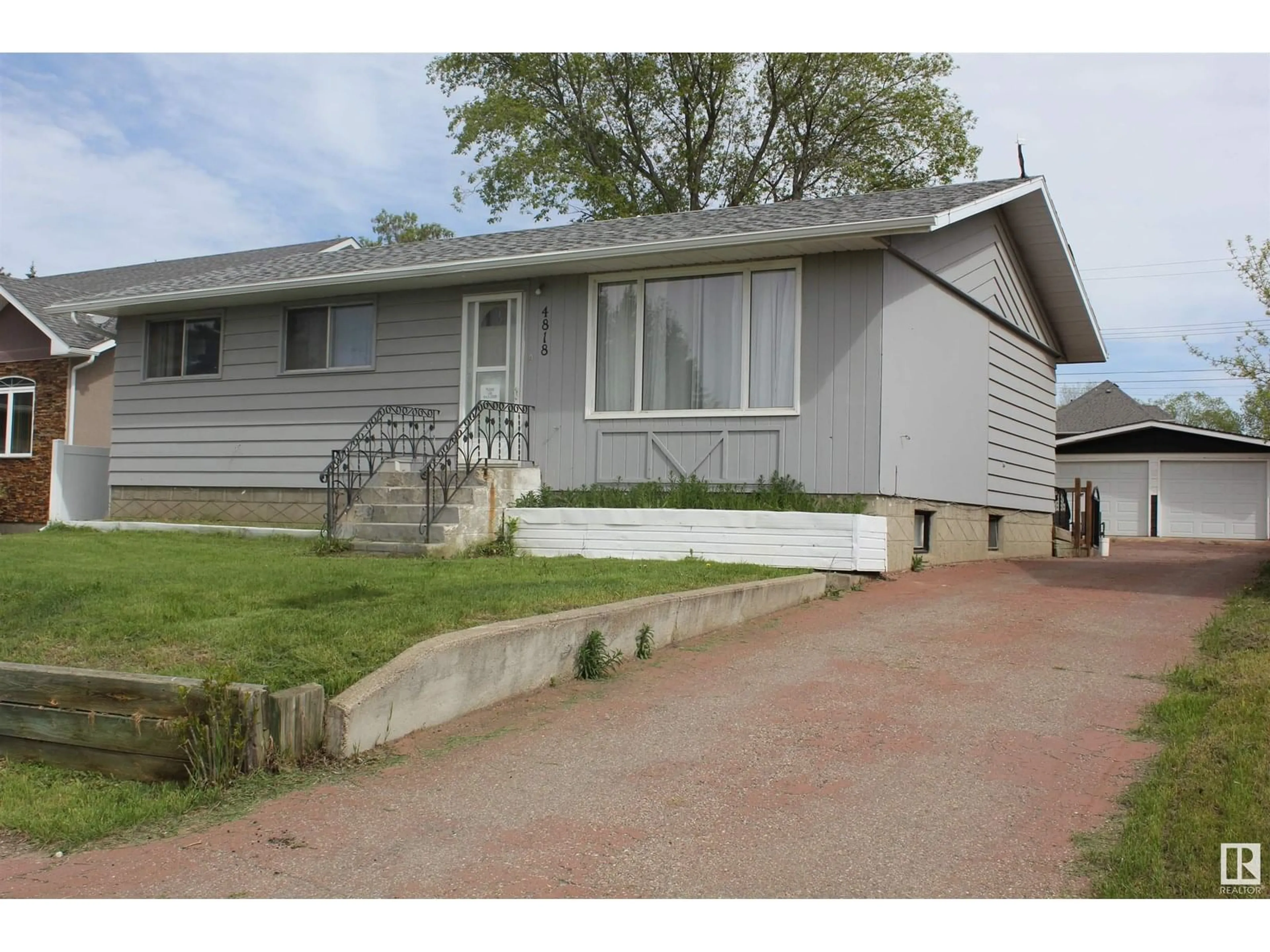 Home with vinyl exterior material, street for 4818 54 AV, Elk Point Alberta T0A1A0