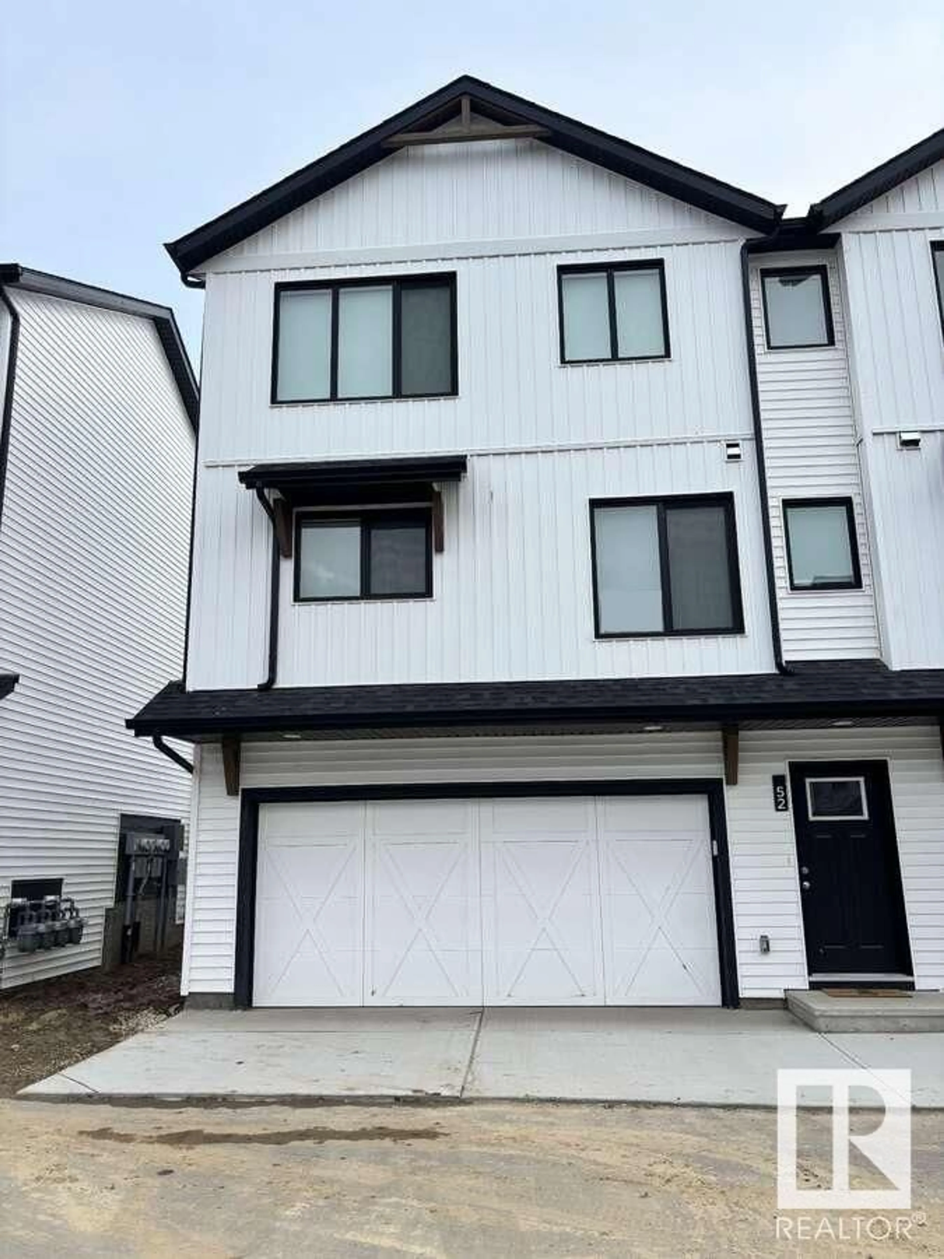 Home with vinyl exterior material, street for #52 - 1025 SECORD PM NW, Edmonton Alberta T5T7V4