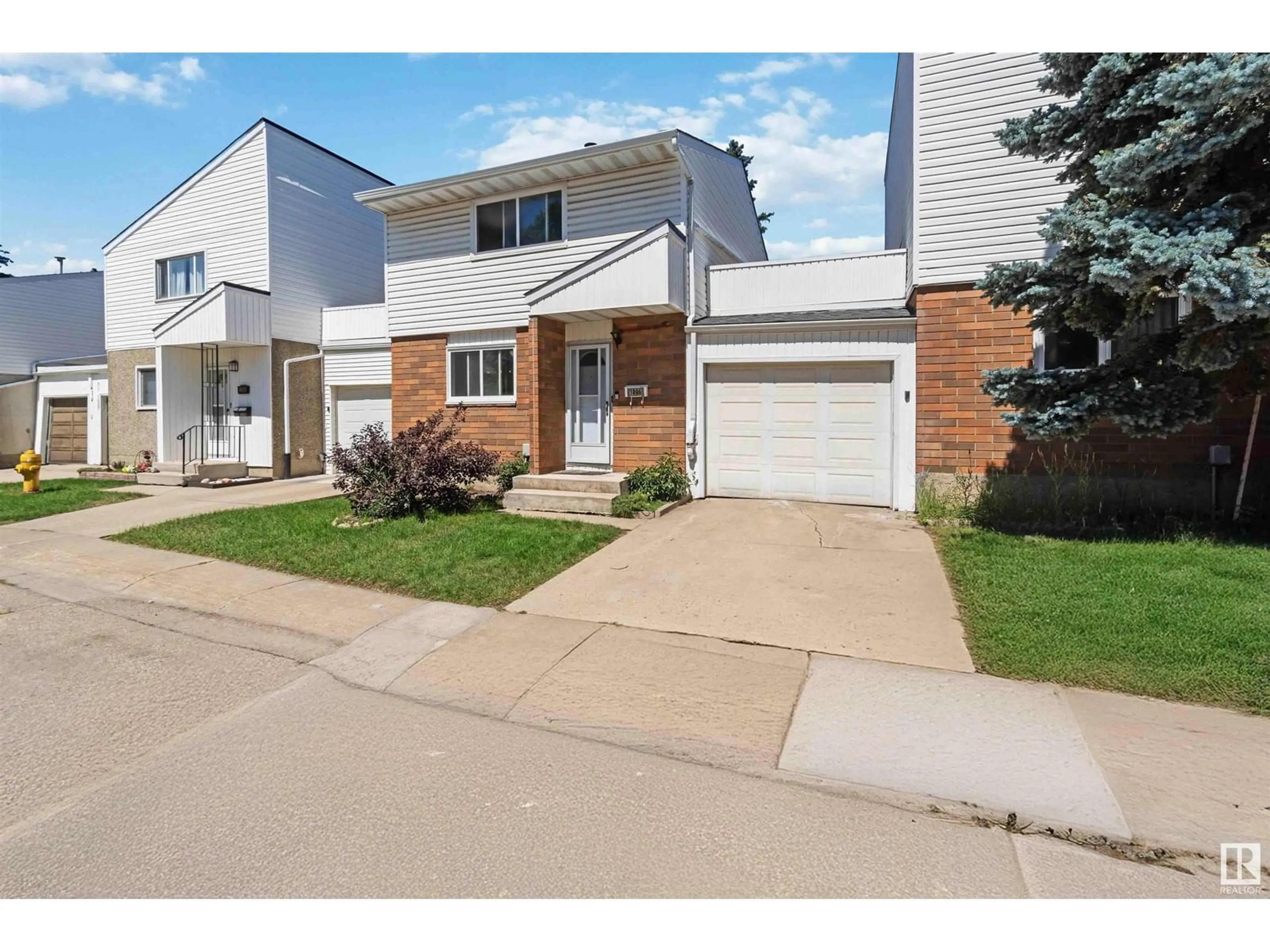 Home with brick exterior material, street for NW - 1096 MILLBOURNE E, Edmonton Alberta T6K1W1