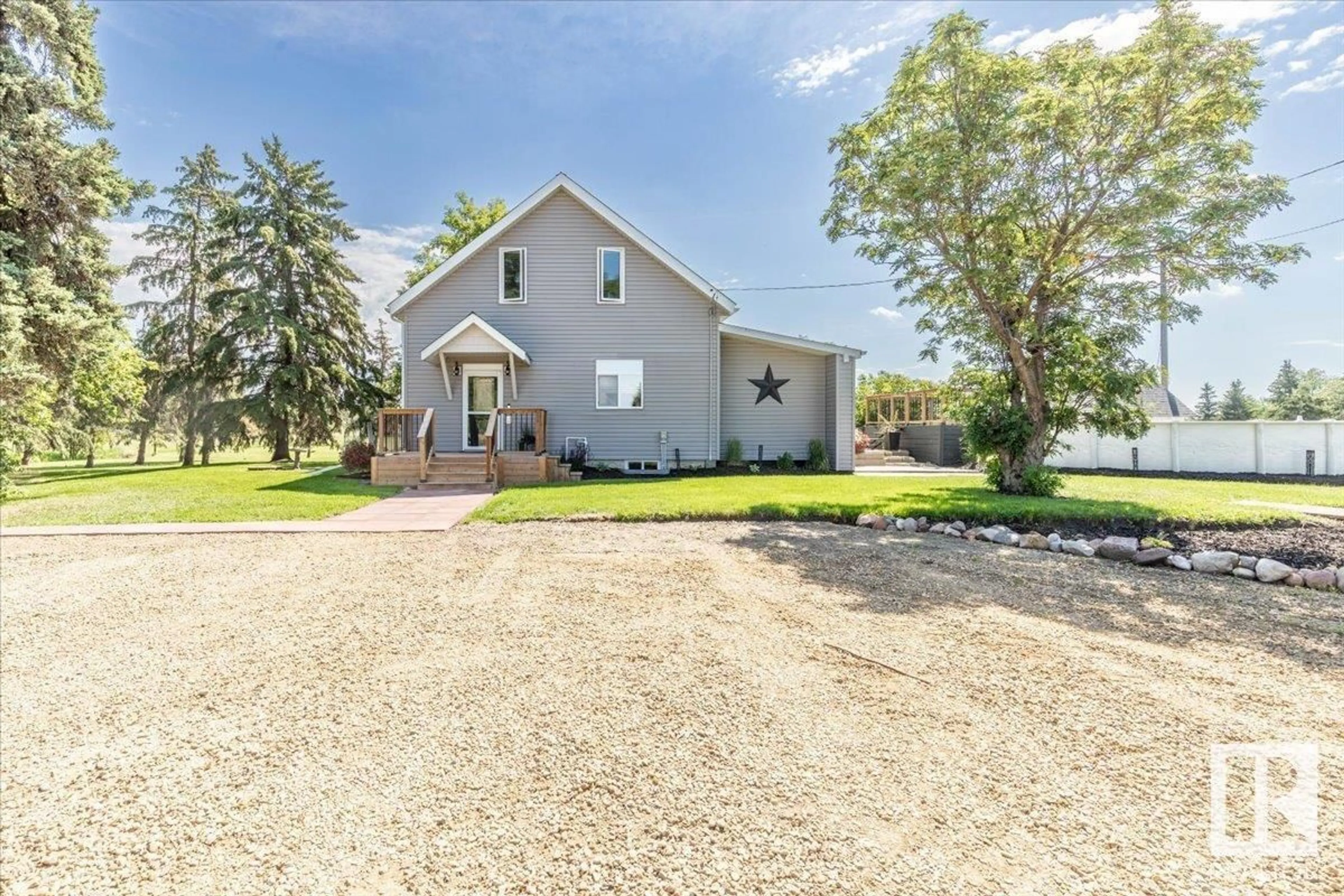 A pic from outside/outdoor area/front of a property/back of a property/a pic from drone, unknown for 462019 RGE ROAD 255, Rural Wetaskiwin County Alberta T9A1W8