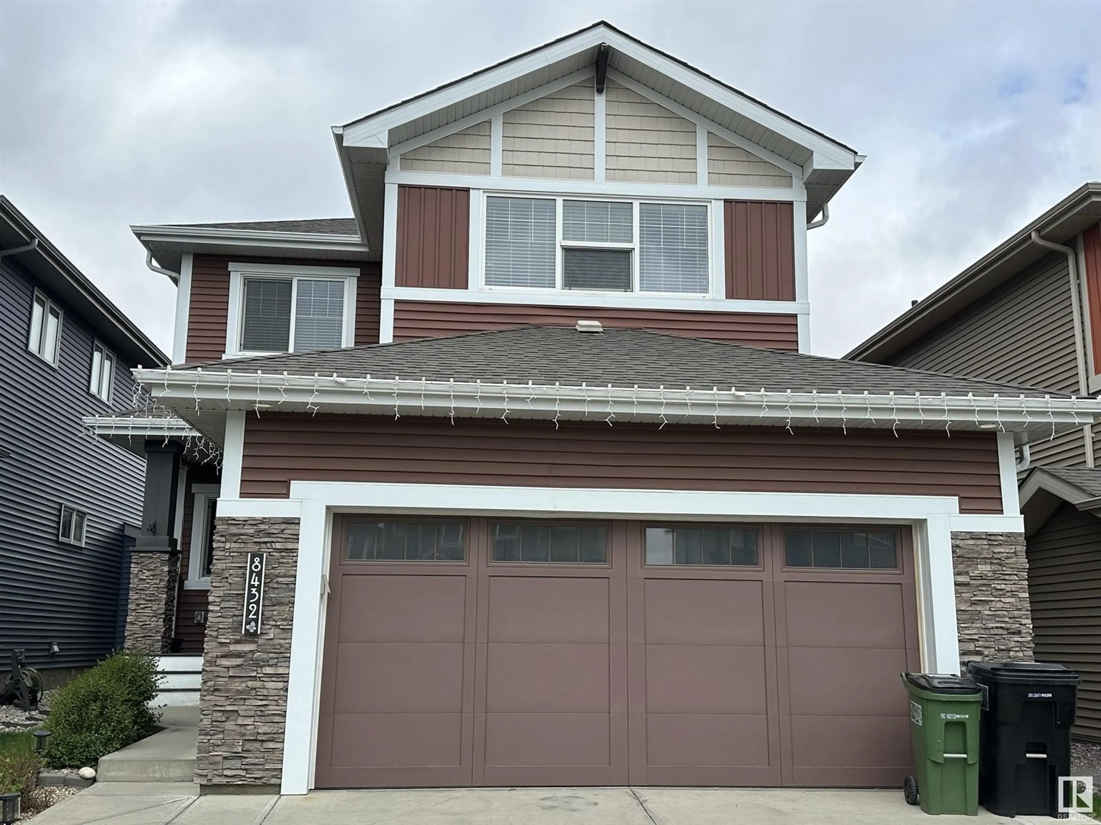 Home with vinyl exterior material, street for NW - 8432 219 ST, Edmonton Alberta T5T7E1