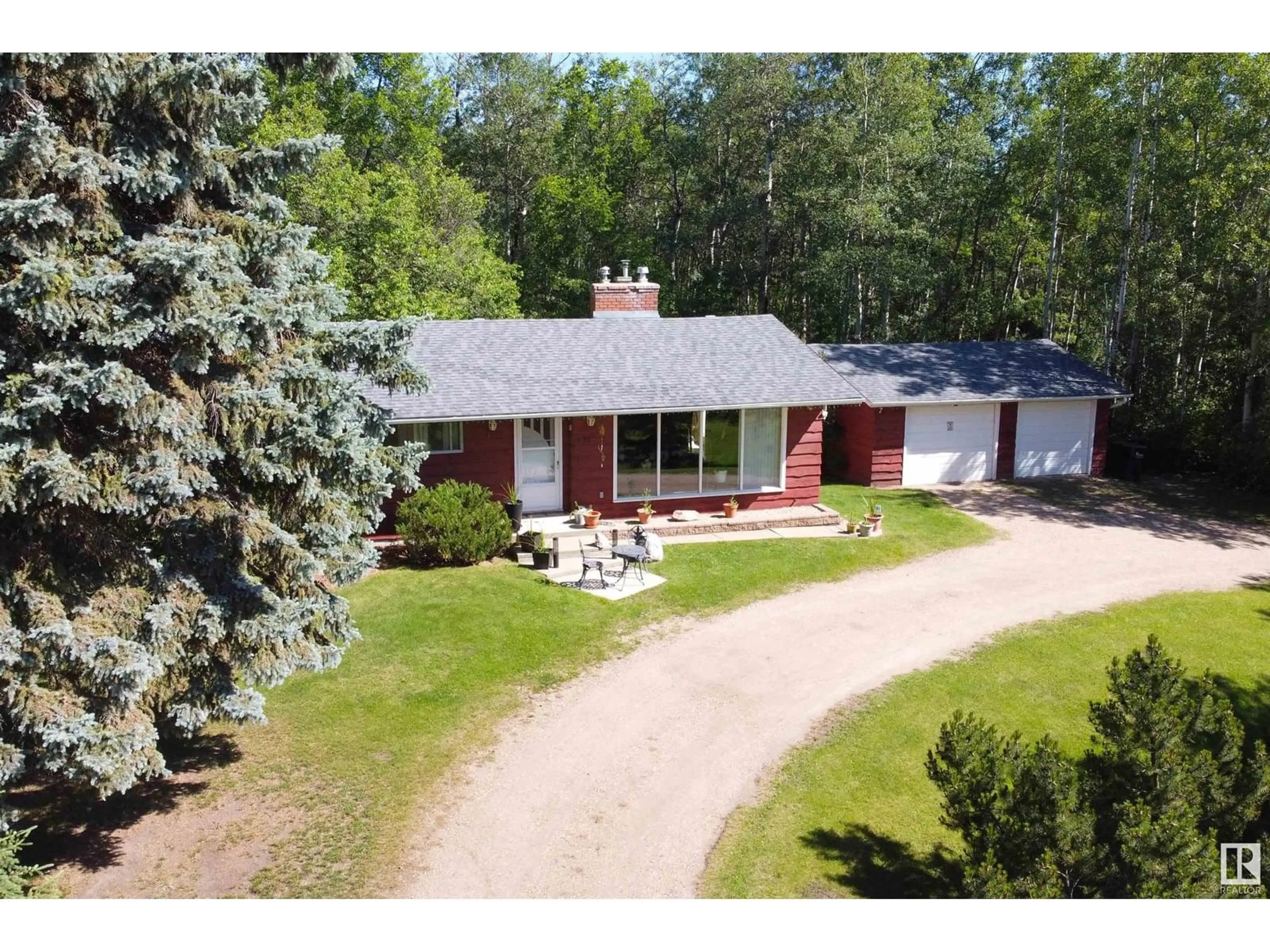 A pic from outside/outdoor area/front of a property/back of a property/a pic from drone, street for 22559 - 451 WYE RD, Rural Strathcona County Alberta T8C1H9