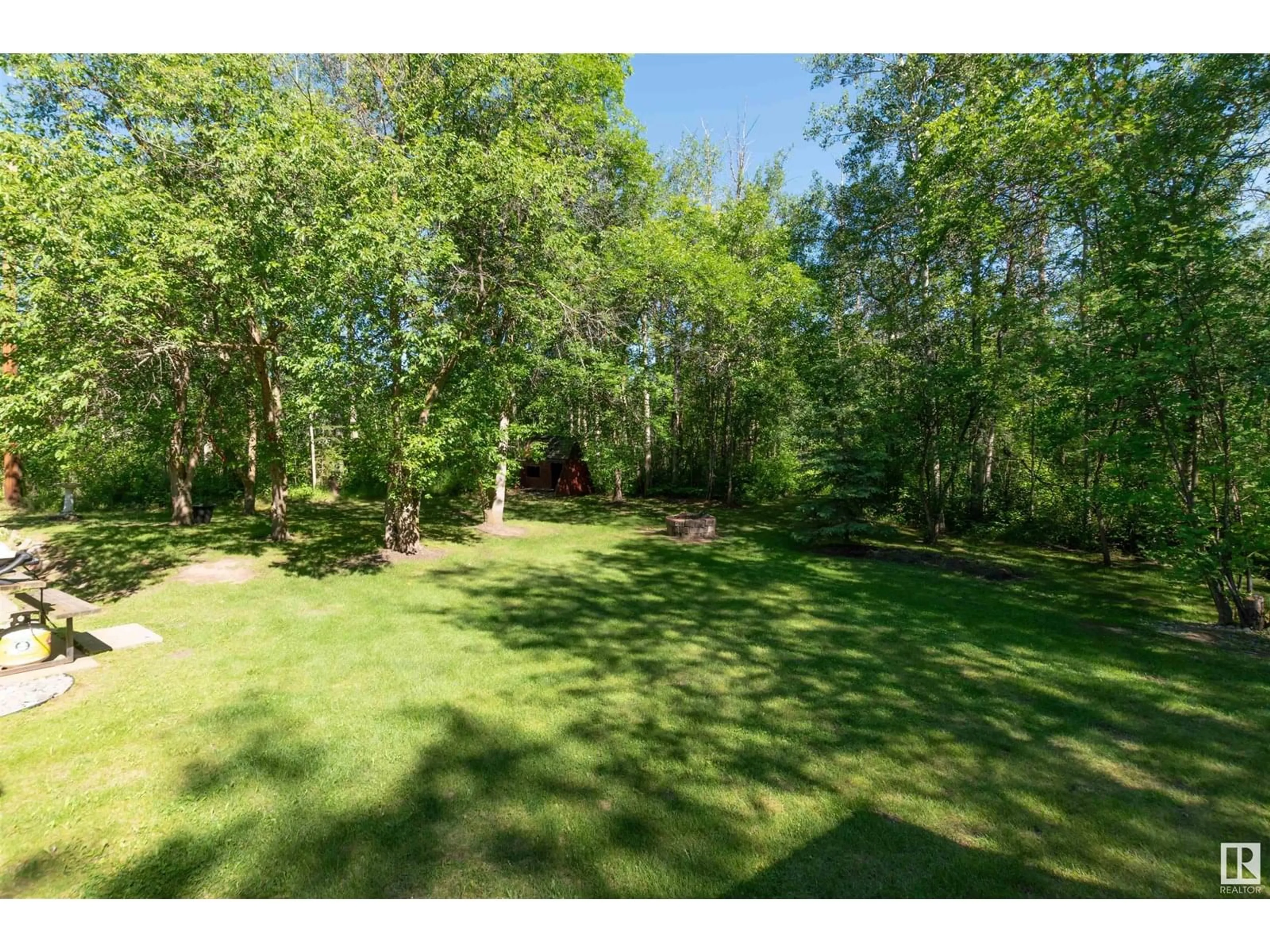 A pic from outside/outdoor area/front of a property/back of a property/a pic from drone, forest/trees view for 22559 - 451 WYE RD, Rural Strathcona County Alberta T8C1H9