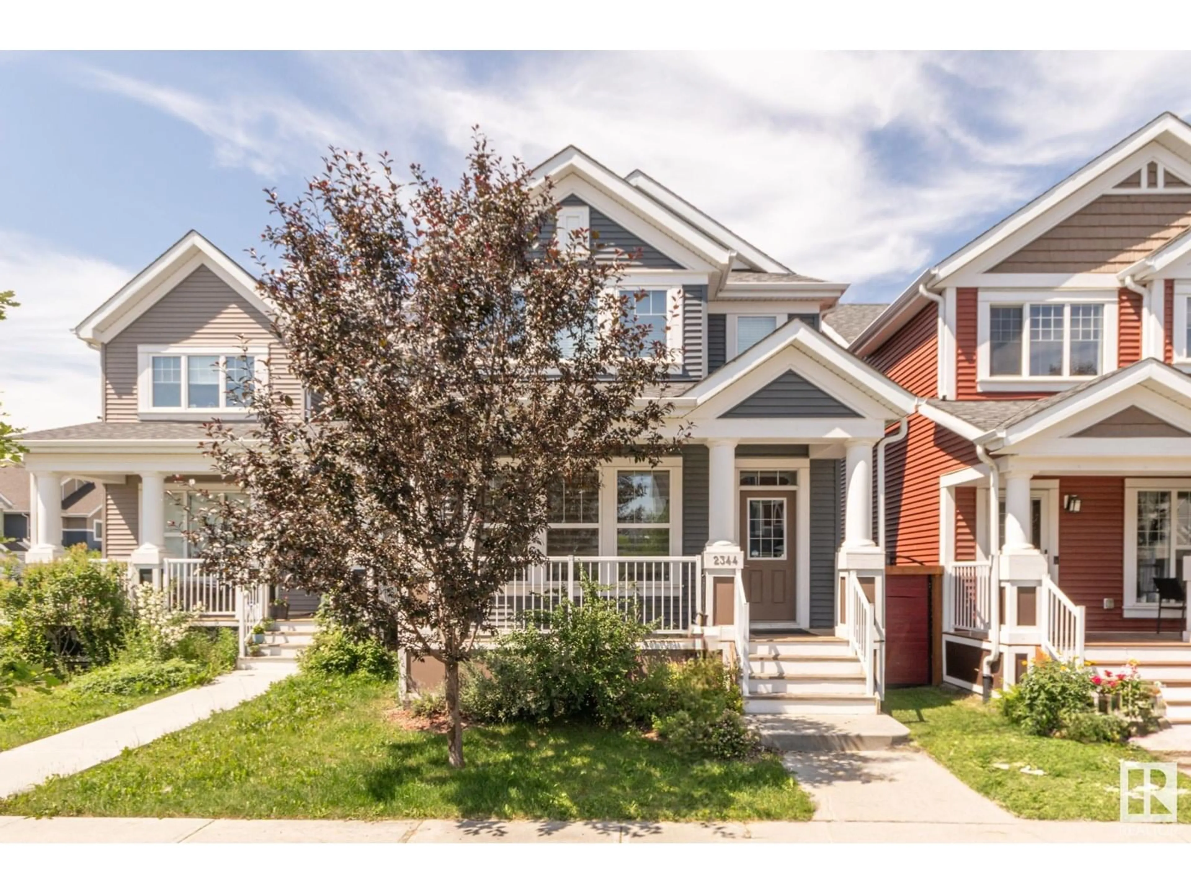 Home with vinyl exterior material, street for 2344 82 ST, Edmonton Alberta T6X2J7