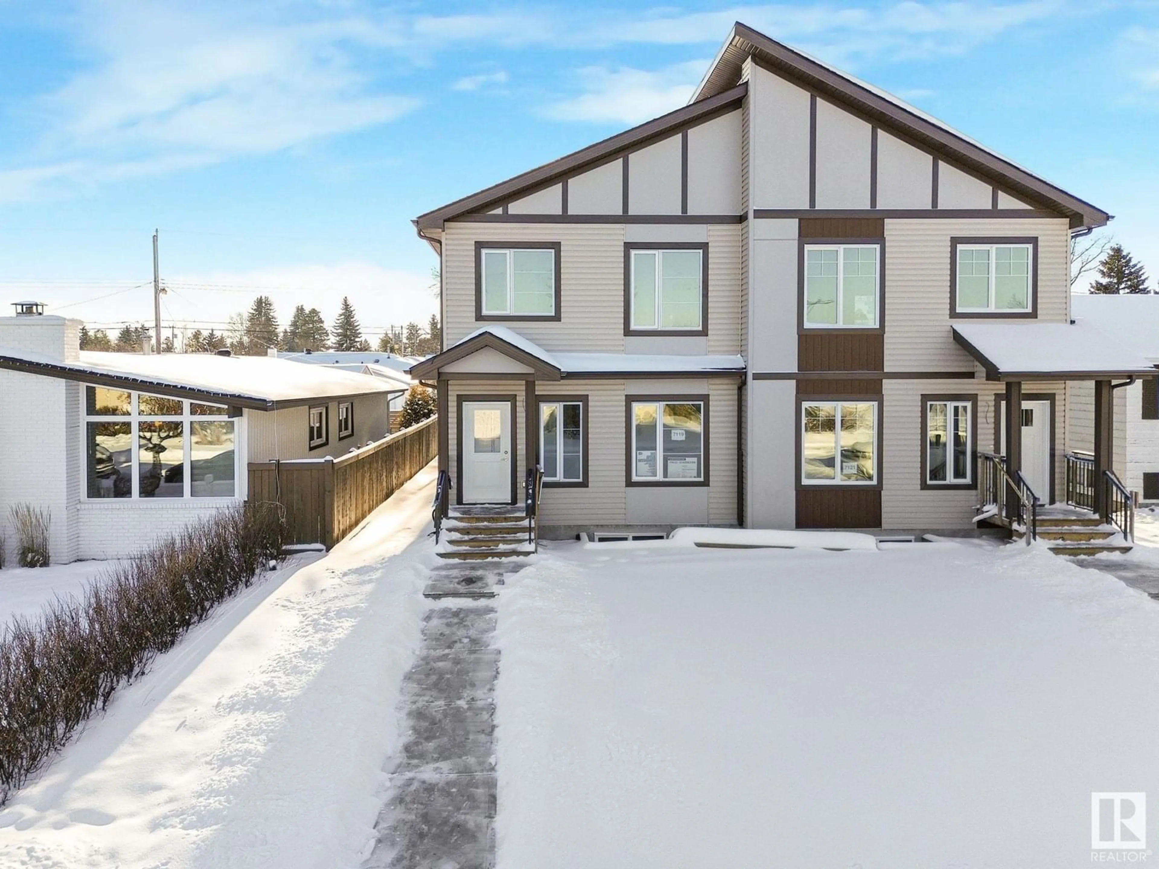 Home with vinyl exterior material, street for 7119 93 AV, Edmonton Alberta T6B0W7