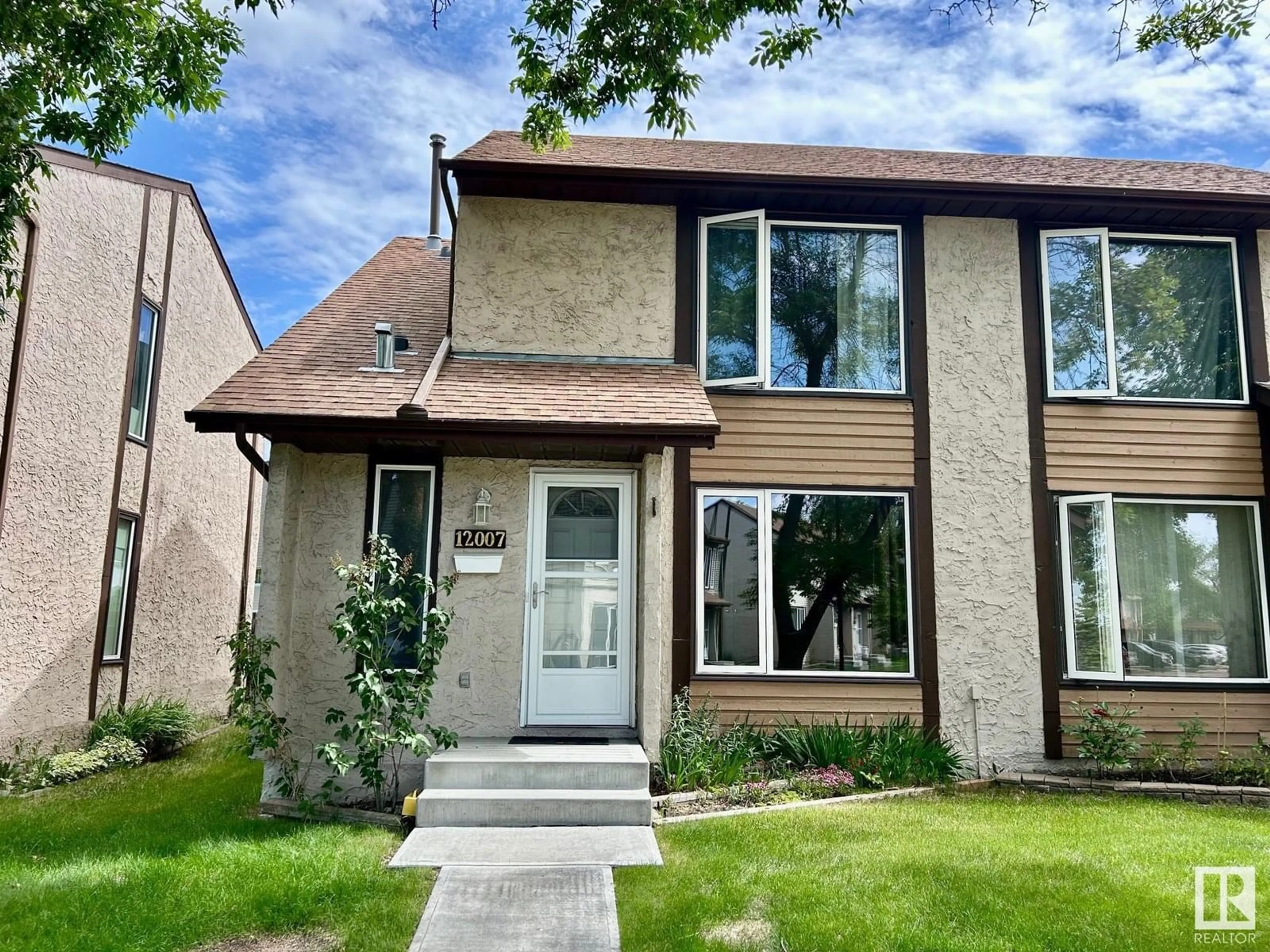Home with brick exterior material, street for 12007 162 AV, Edmonton Alberta T5X3R1